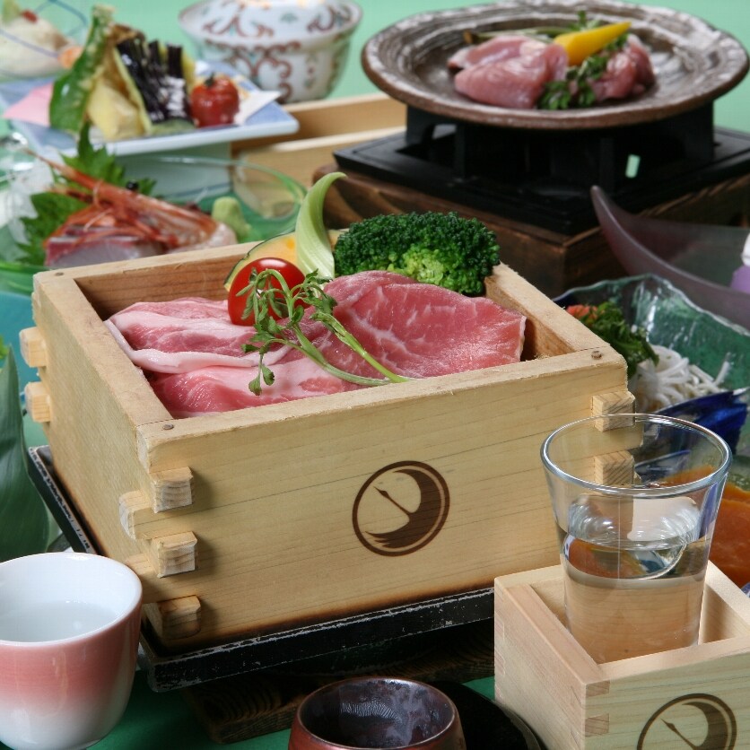 Steamed sake in a steamer