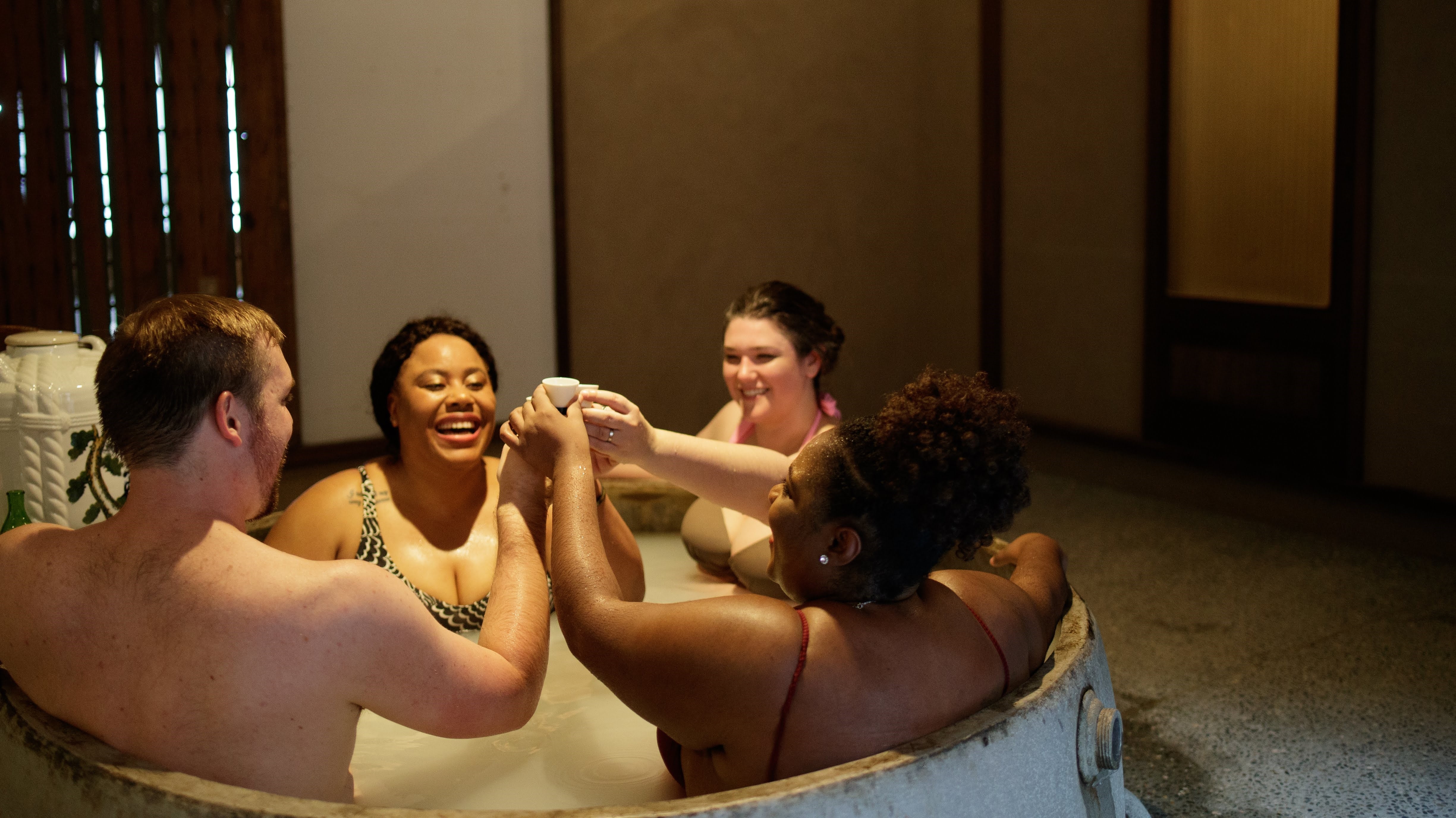 Cheers in the cauldron bath!