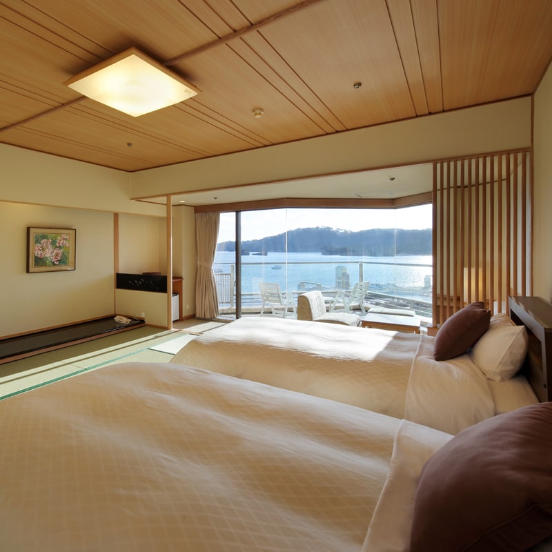 An example of a Japanese-style twin room facing the sea