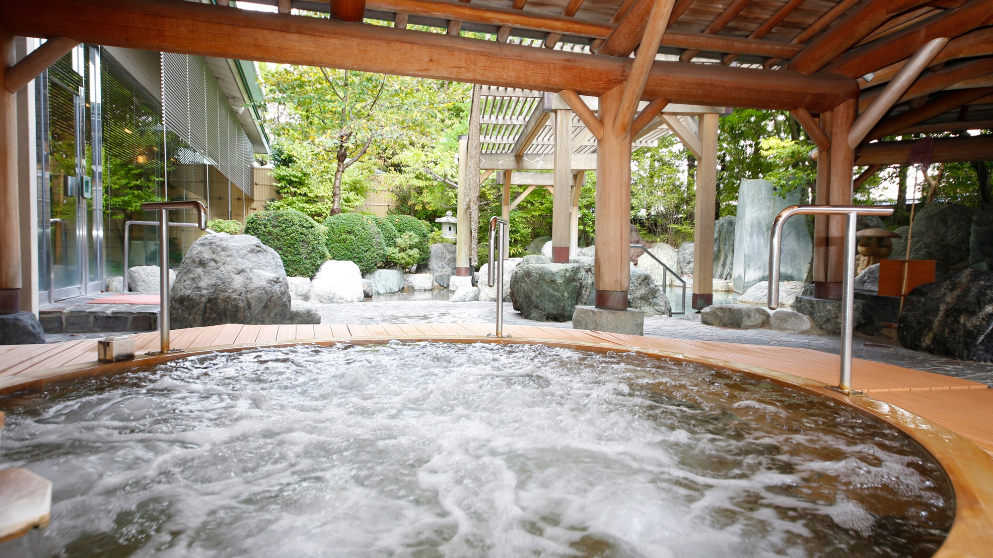 A cypress-made jacuzzi bath that is warm to the core of your body.