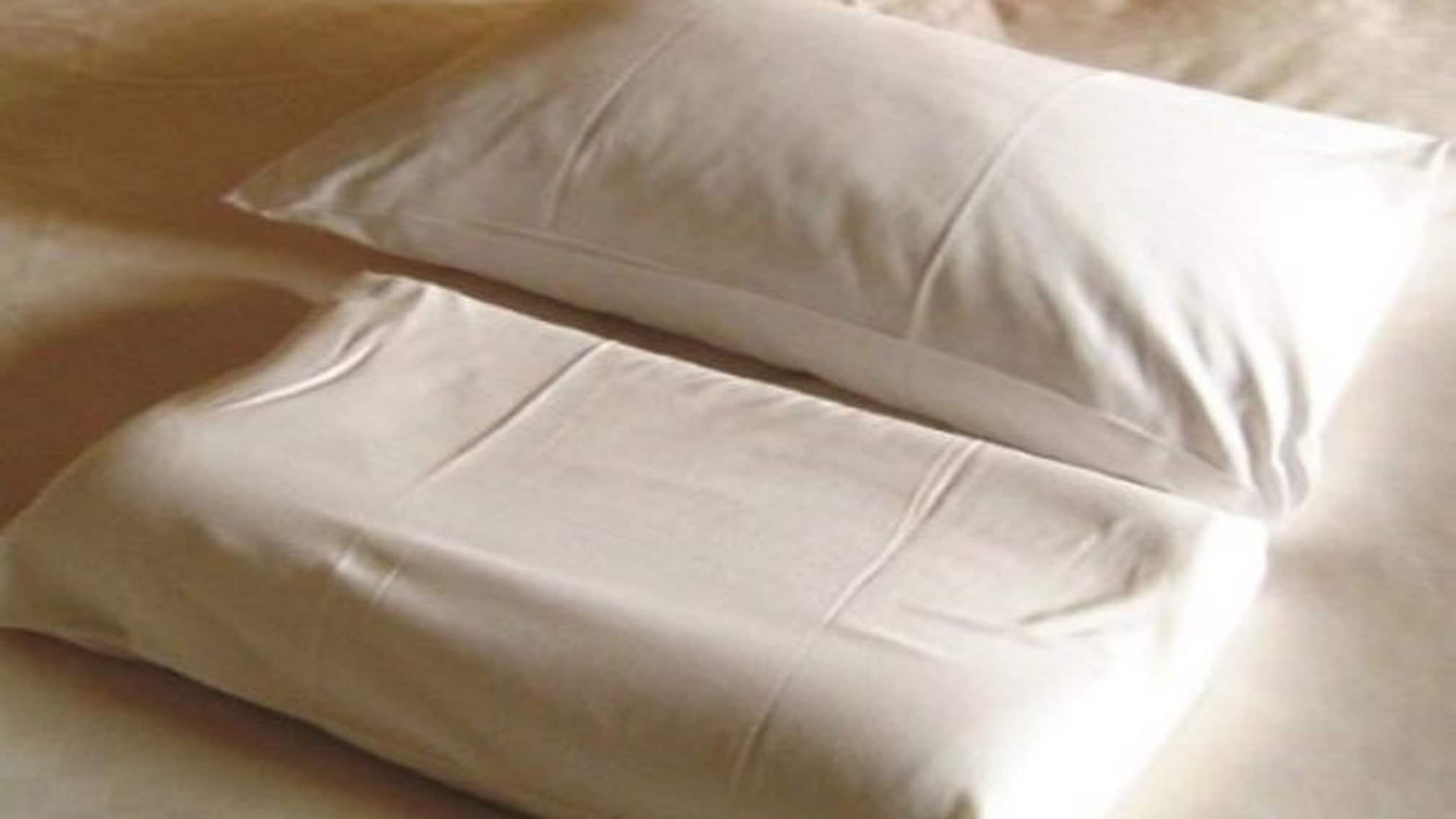 Two types of pillows that are important for a good night's sleep: memory foam pillows and feather pillows