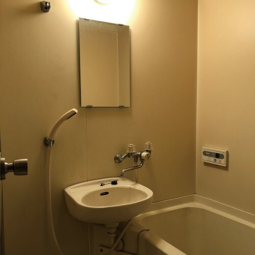 With bath and toilet
