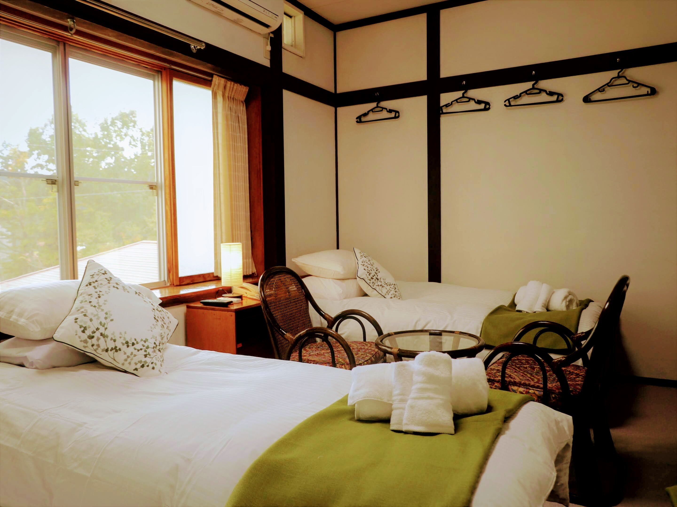 Quadruple room with shared bathroom