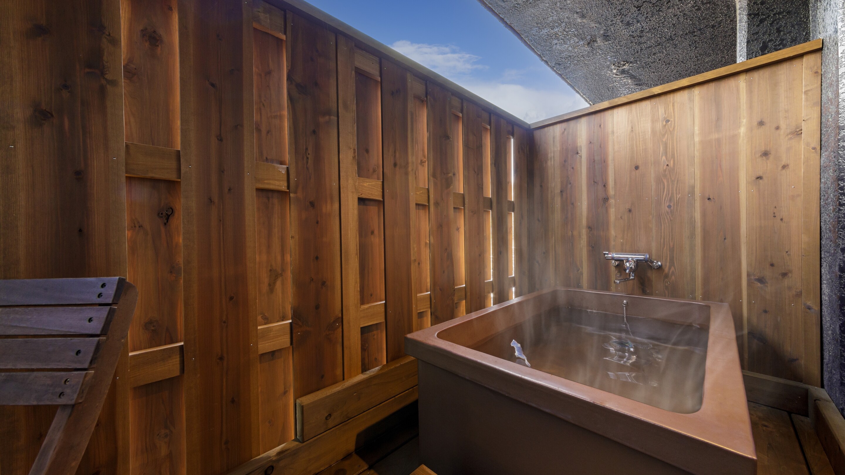 Standard Japanese-style room with open-air bath *An example of an open-air bath in a guest room