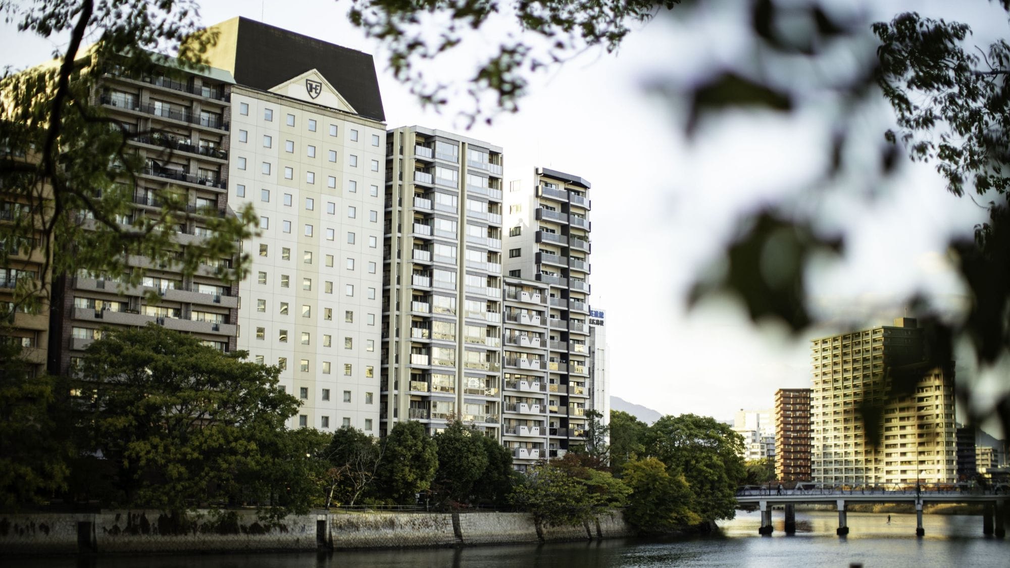 Exterior view of the hotel from the opposite bank