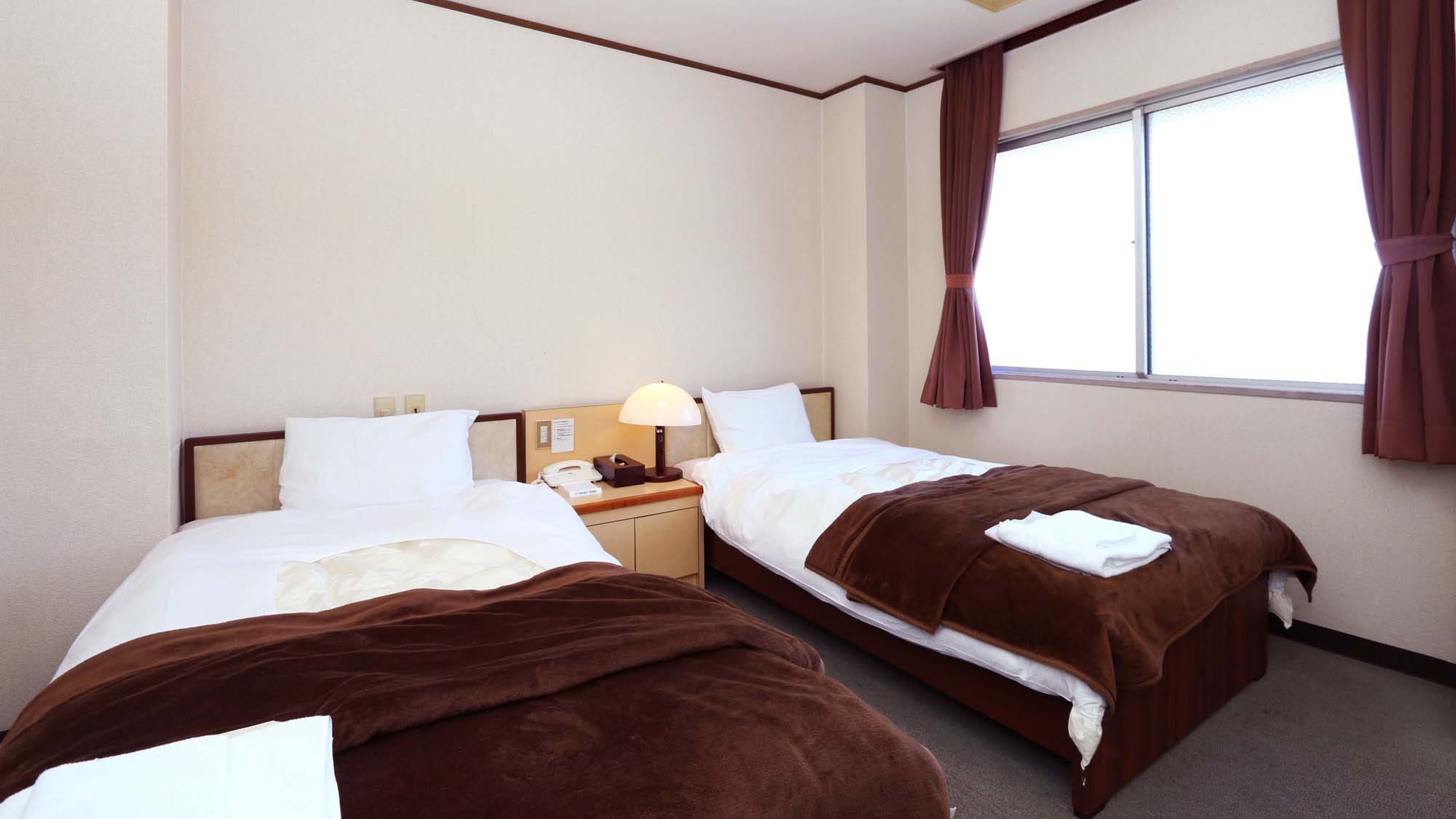 Twin room. Perfect for business travelers or couples!