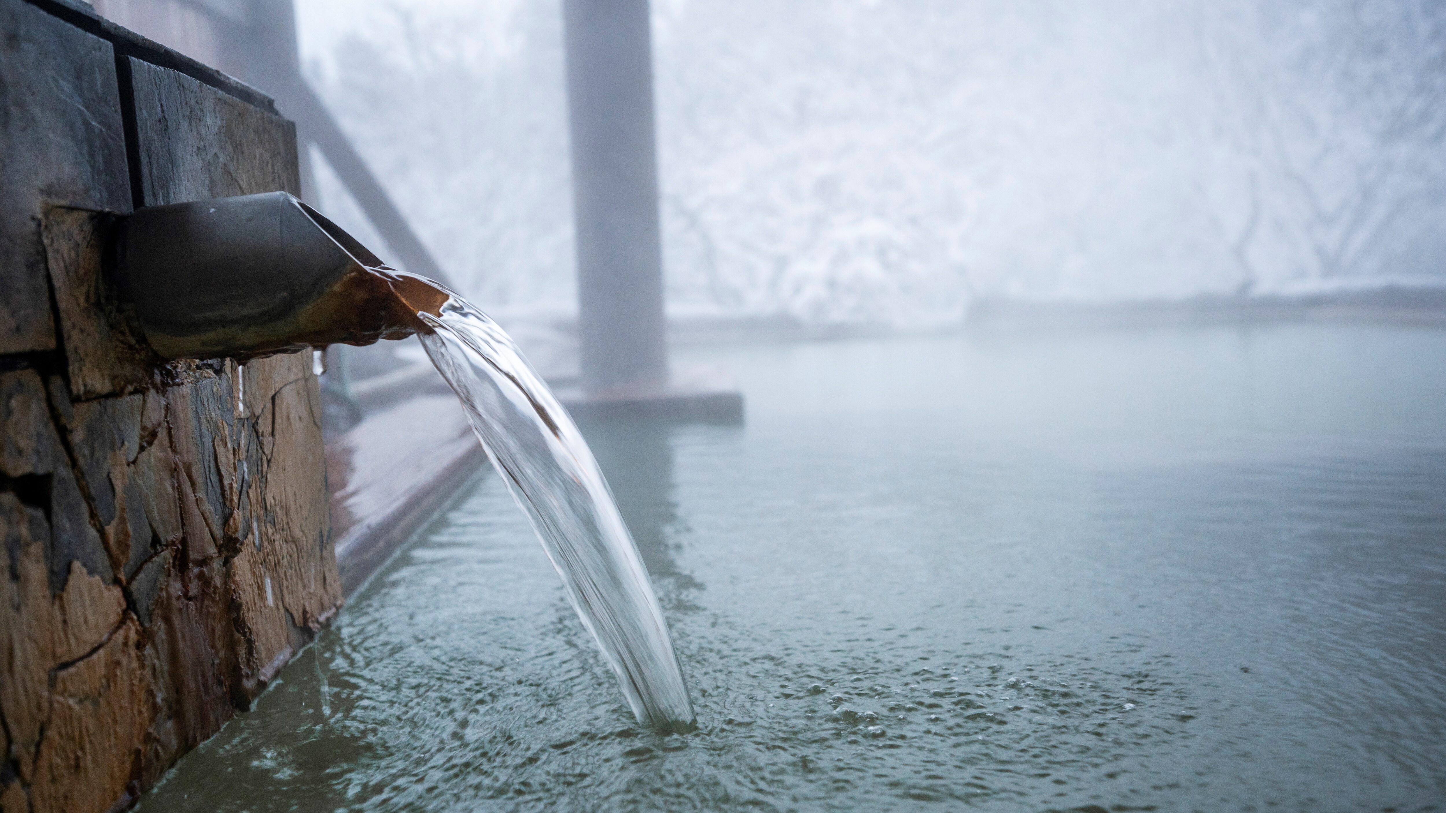 Open-air hot spring bath with natural hot spring water