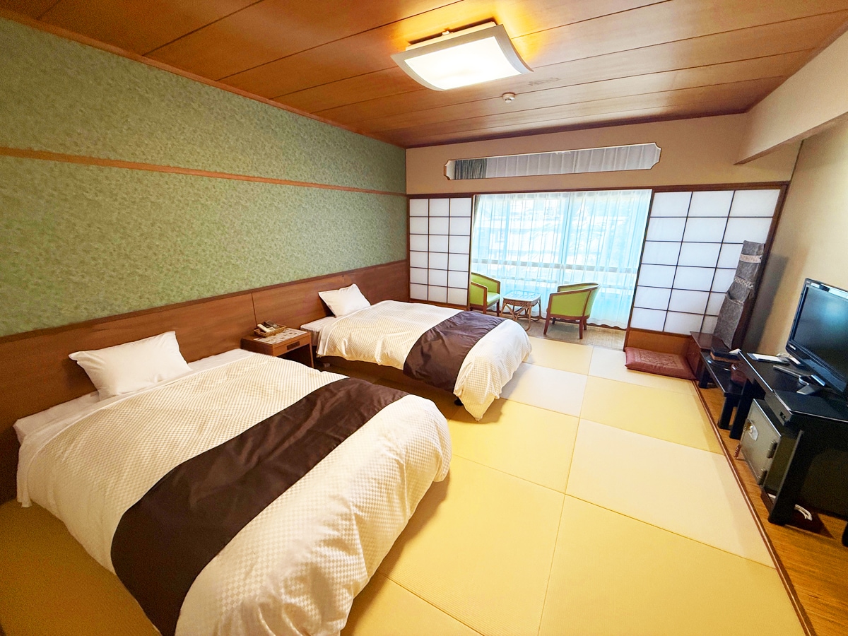 Kamar modern Jepang dengan dua tempat tidur dalam ruangan bergaya Jepang [Bebas rokok]