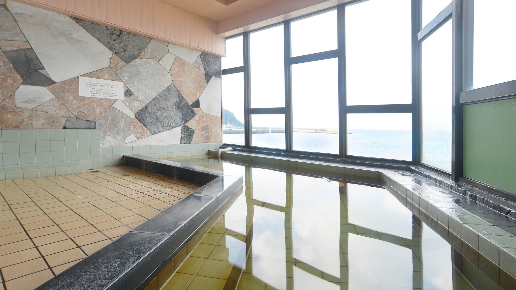 * [Large communal bath] Our proud observation bath with a panoramic view of the Genkai Sea.