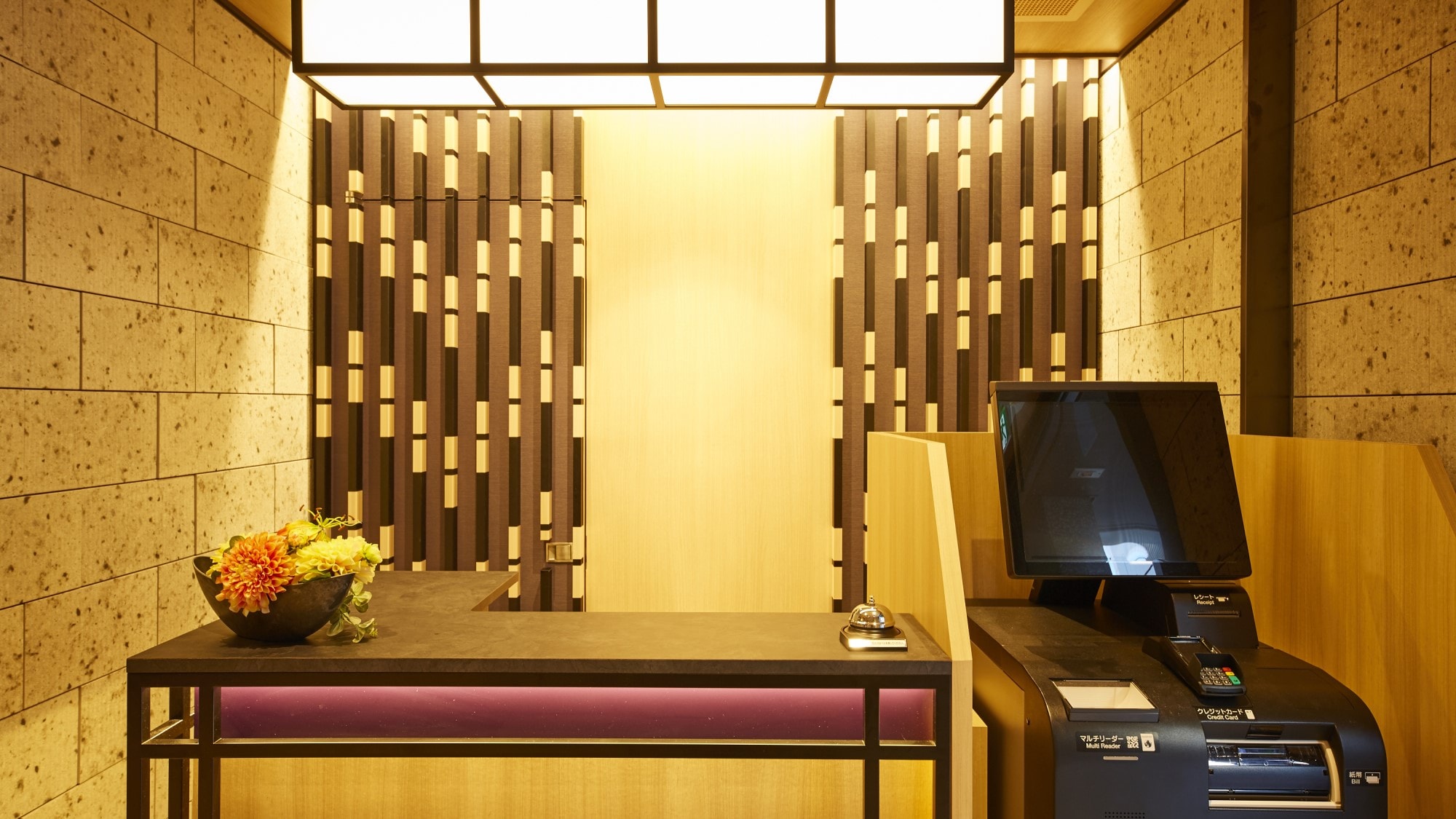 There is also an automatic check-in machine at the front desk.