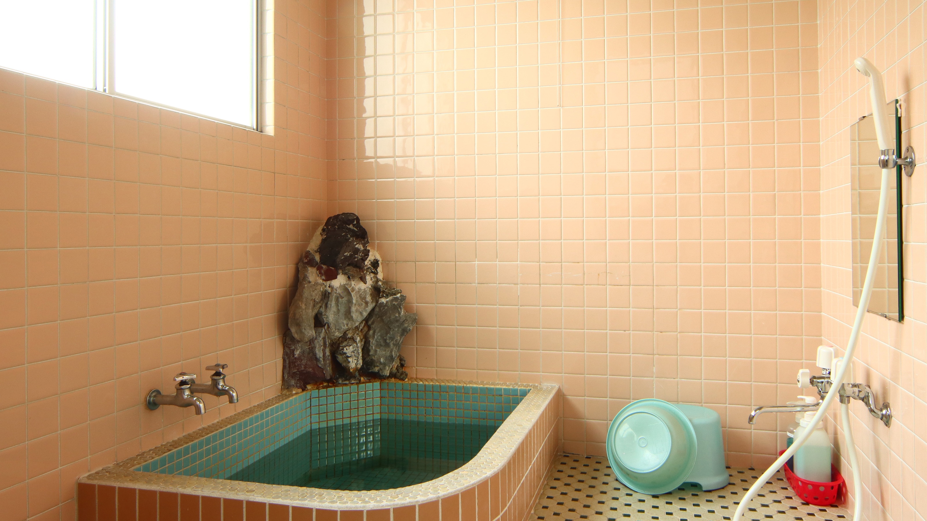 We have two compact private baths available.