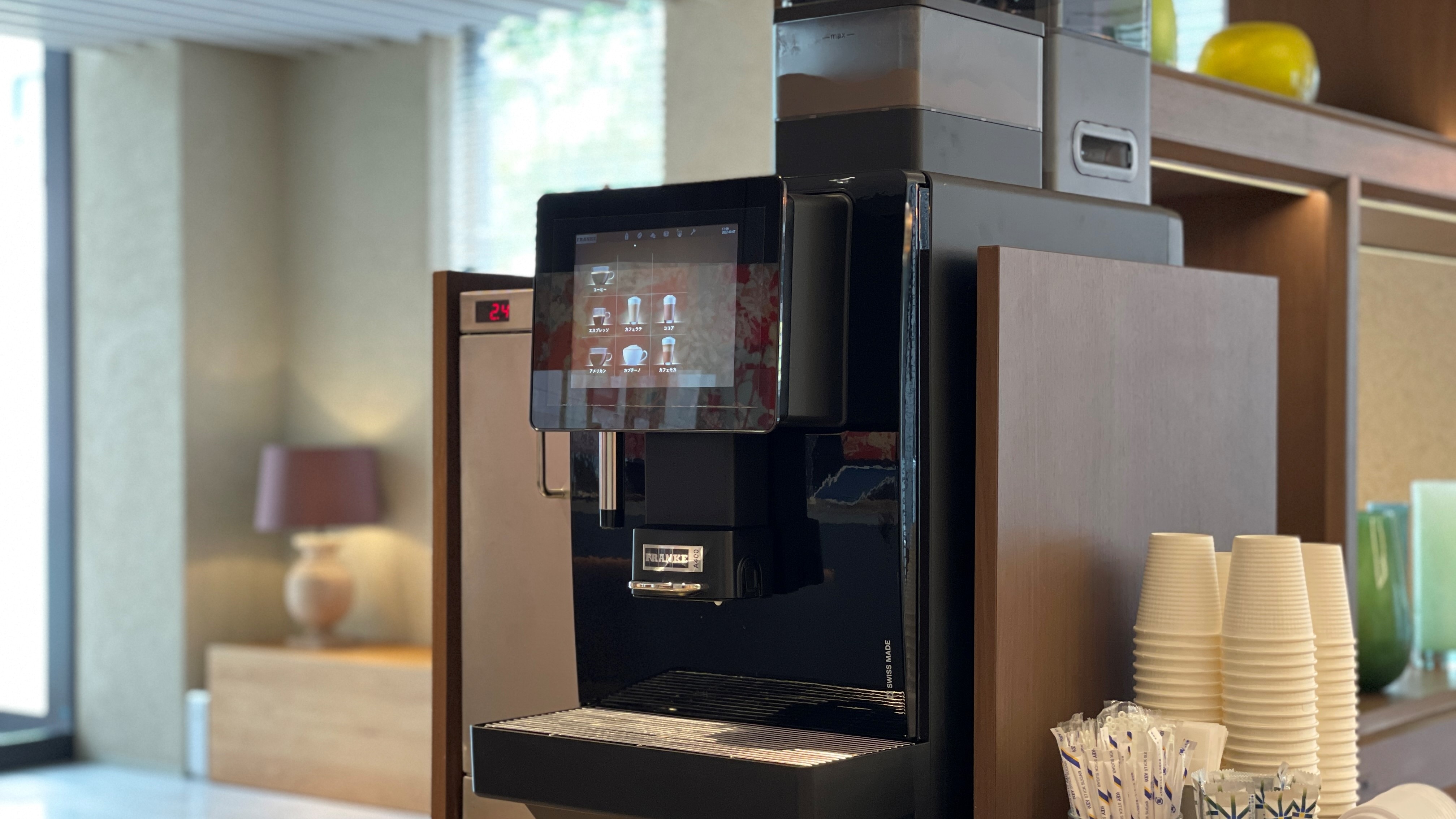 There is a coffee server in the lobby. Please feel free to use it.
