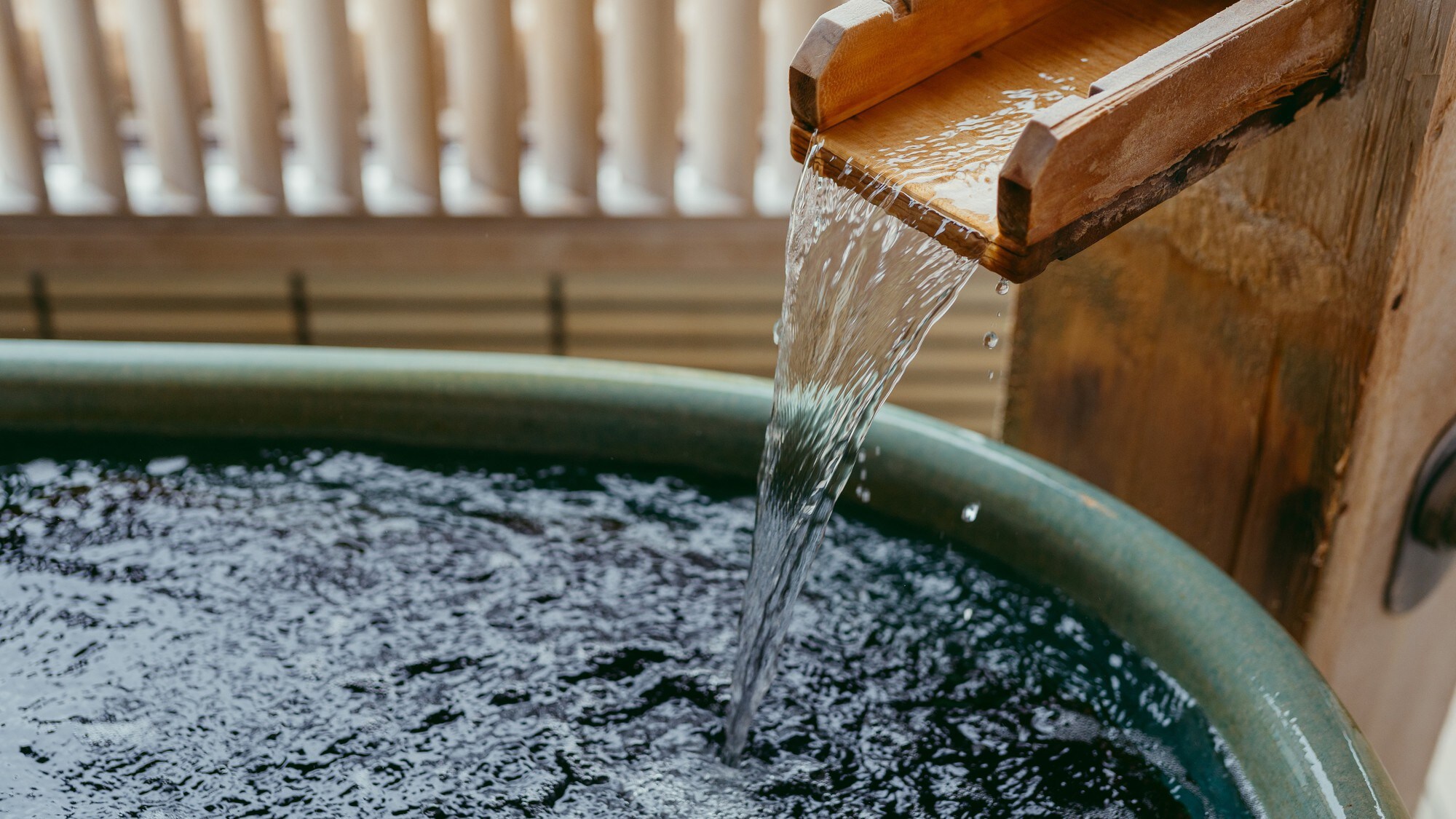 Image of a guest room with an open-air bath