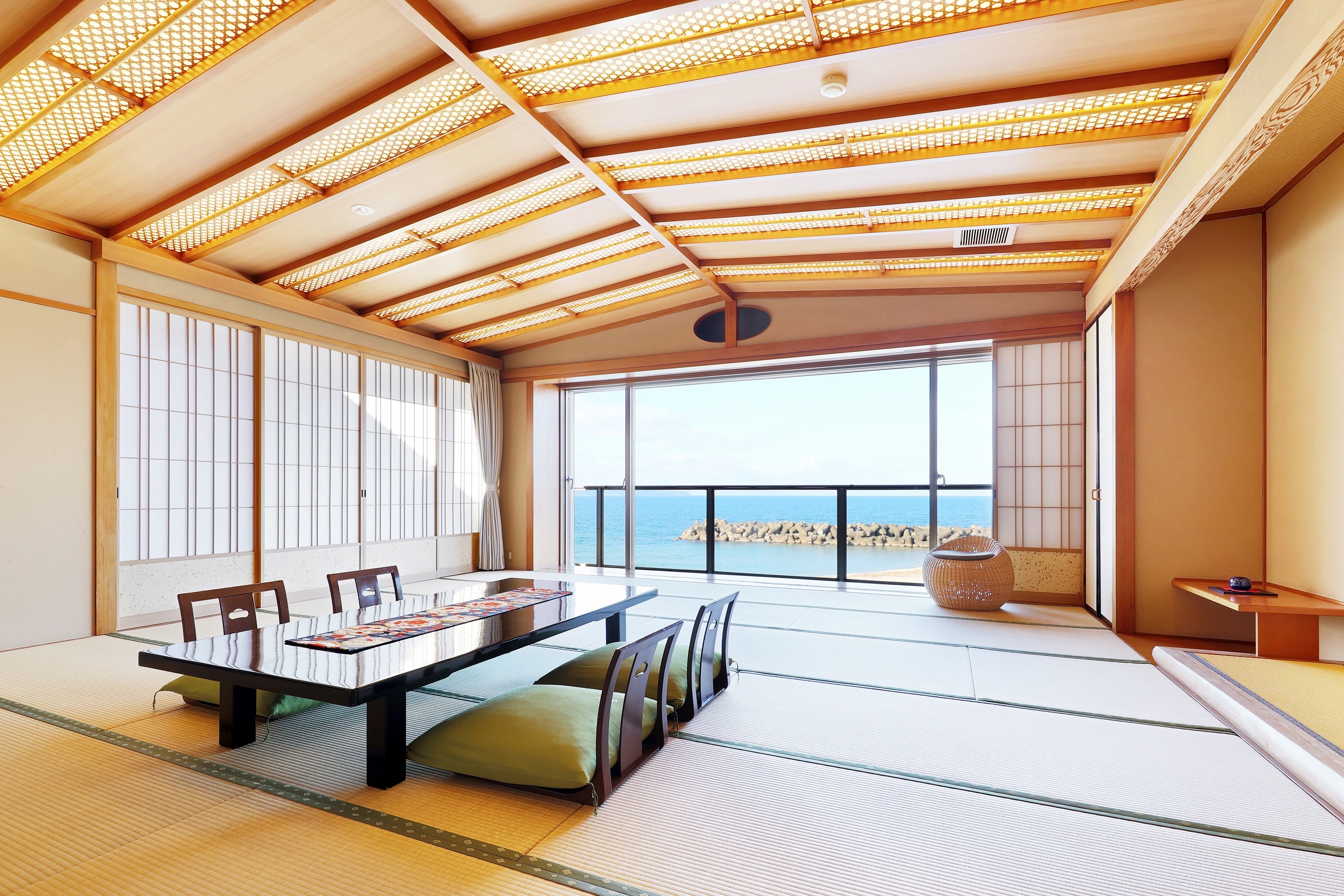 Large room with massage chair facing the ocean 201