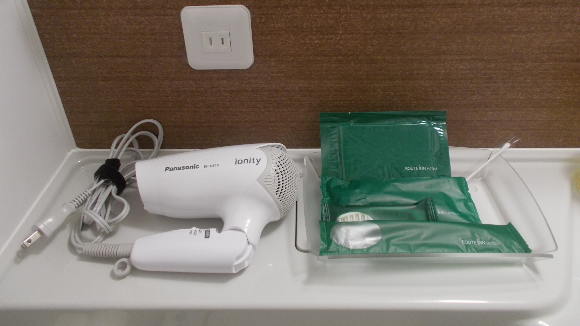 Unit bath equipment Hair dryer and amenities