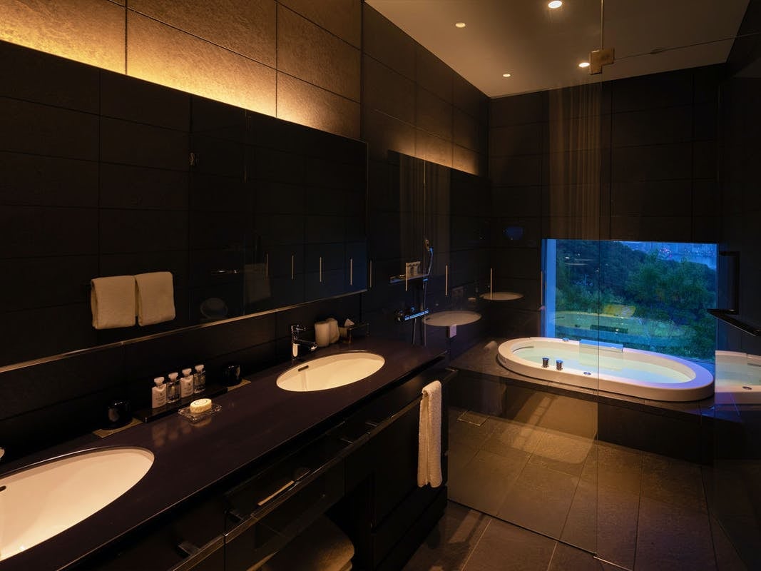 With jacuzzi bath