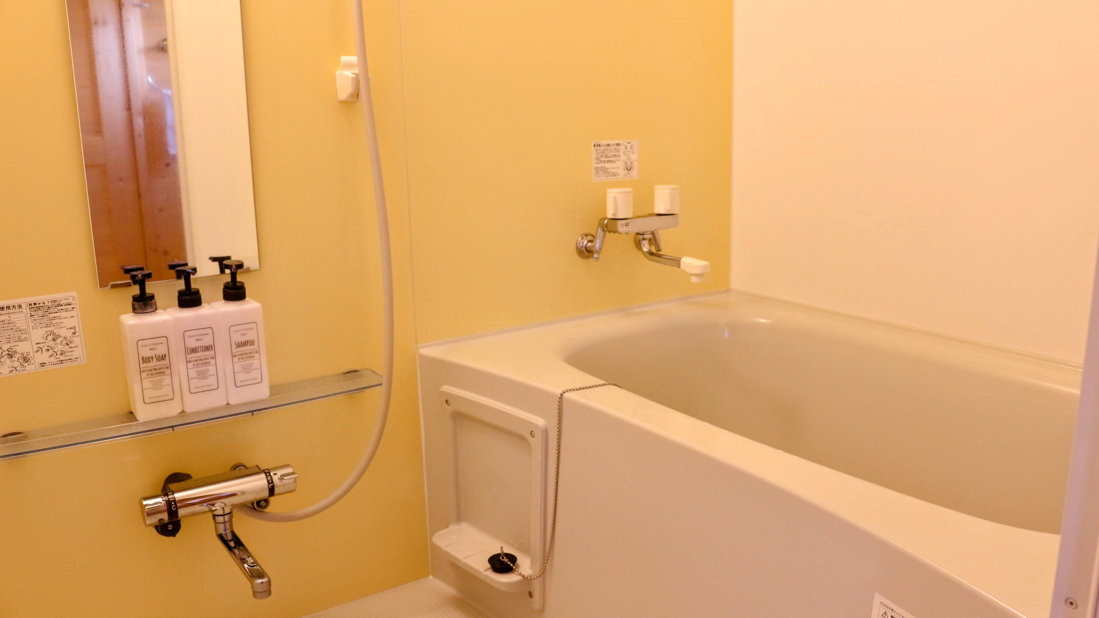 The bathroom is separate from the toilet