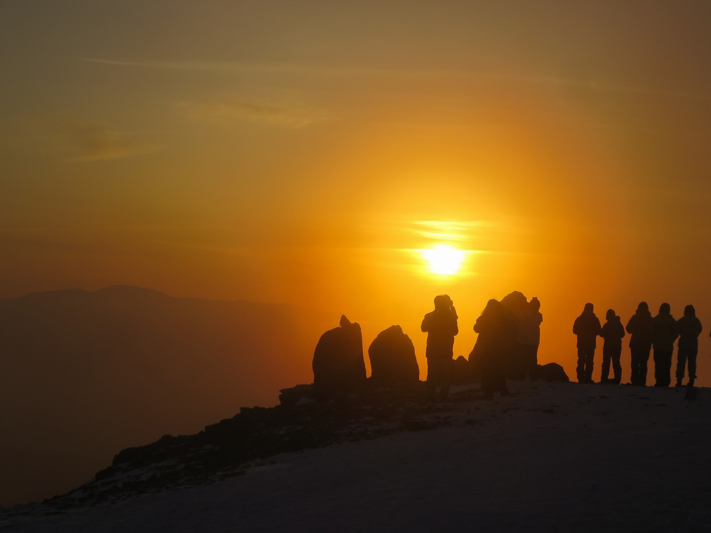 Let's go see the sunset on a snowmobile