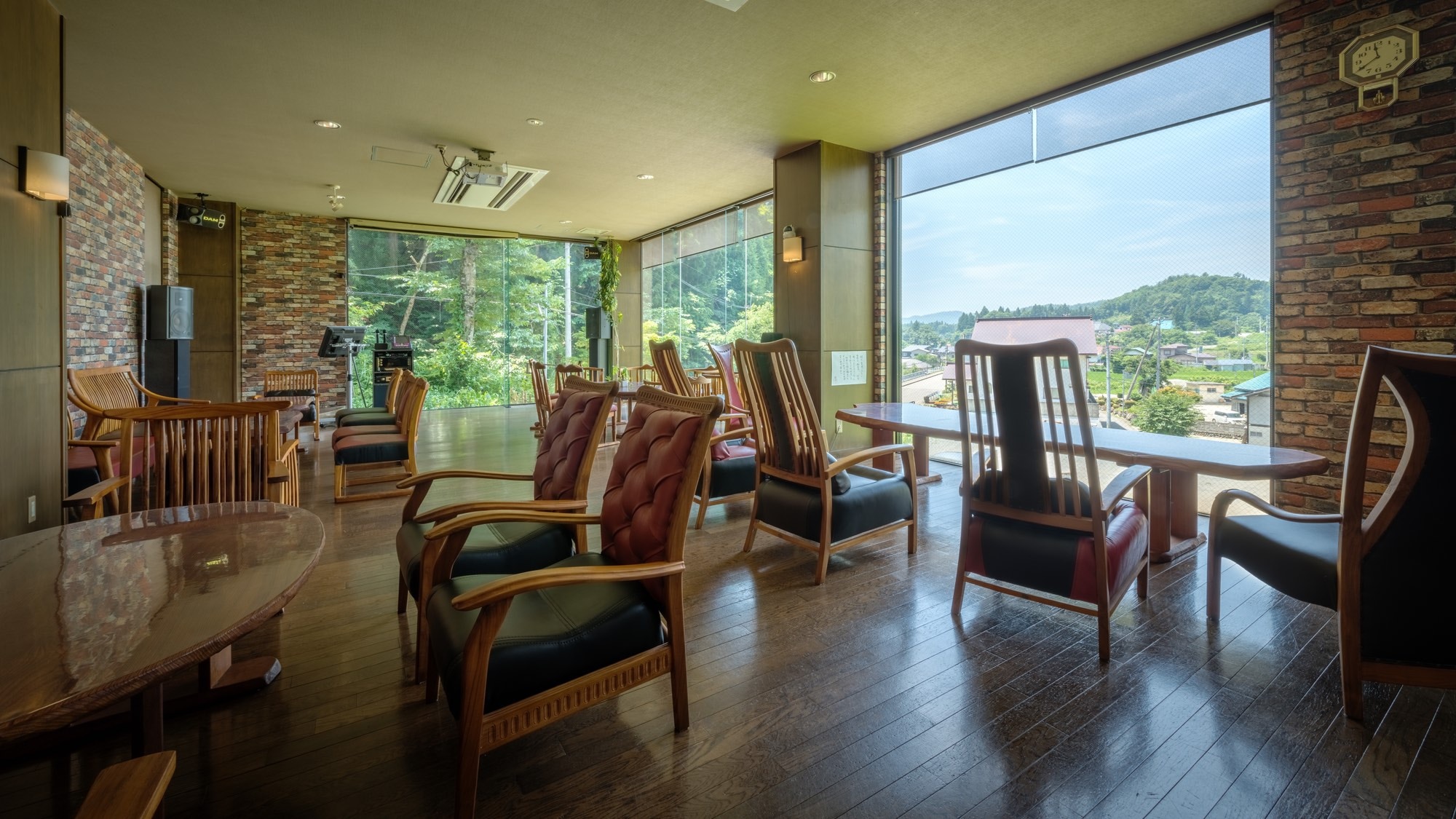 [Open-air lounge with a view of the mountains]