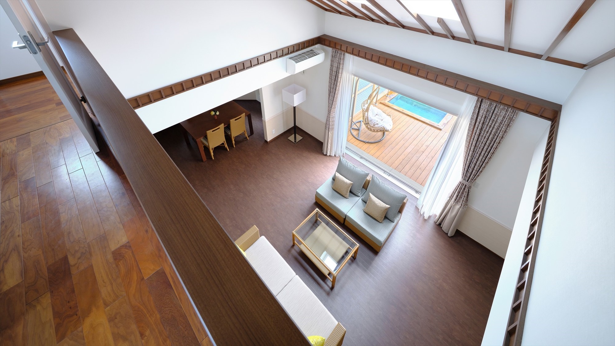 [Aqua Terrace Spa Suite] A maisonette-type suite with a living room and dining room on the first floor