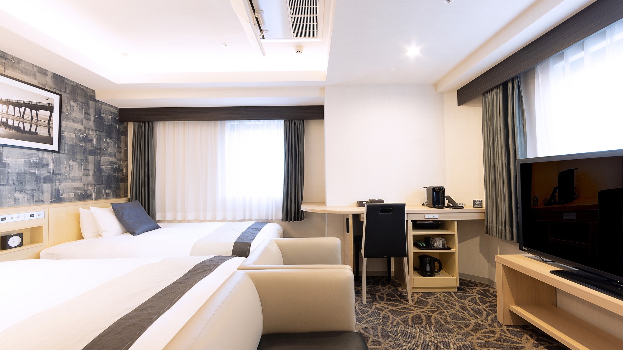 豪华双床房 *每位成人最多可让 1 名儿童使用同一张床。