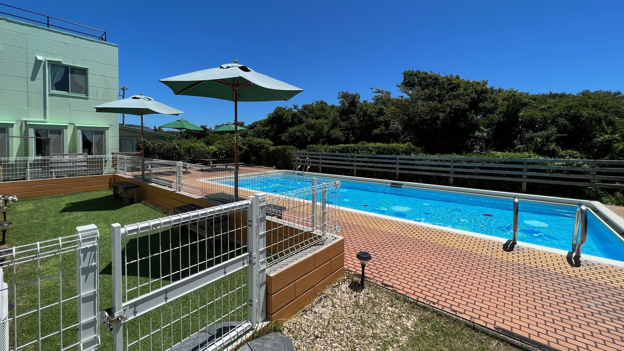 A dog run and pool exclusively for guests