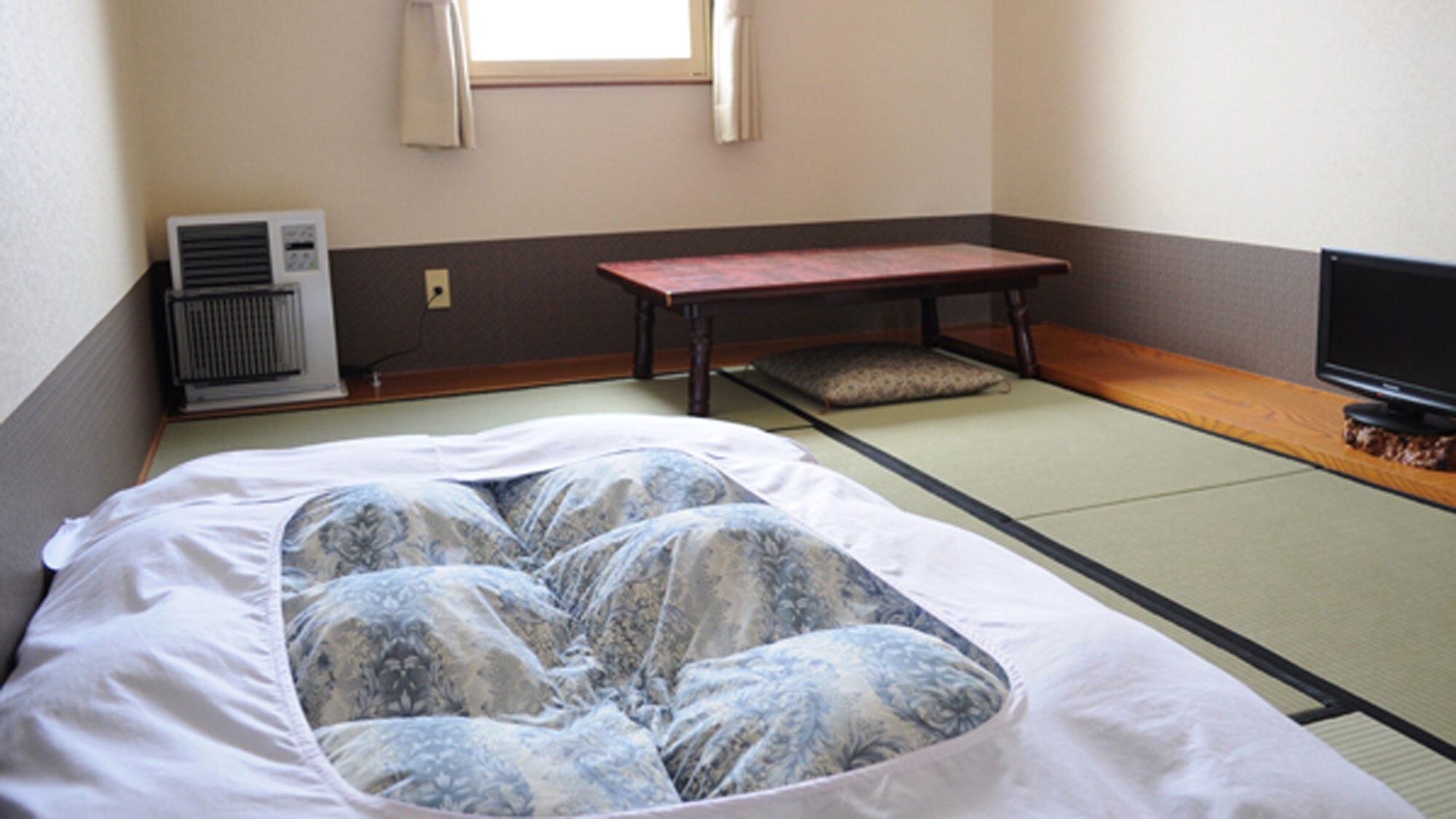 [Example of a Japanese-style room] A Japanese-style room where you can feel the warmth of tatami mats.