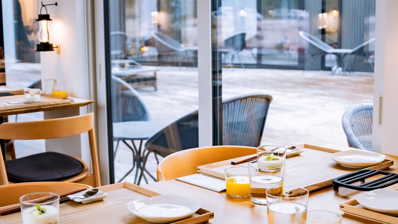 Savor seasonal ingredients amid the aroma of a wood-fired fire