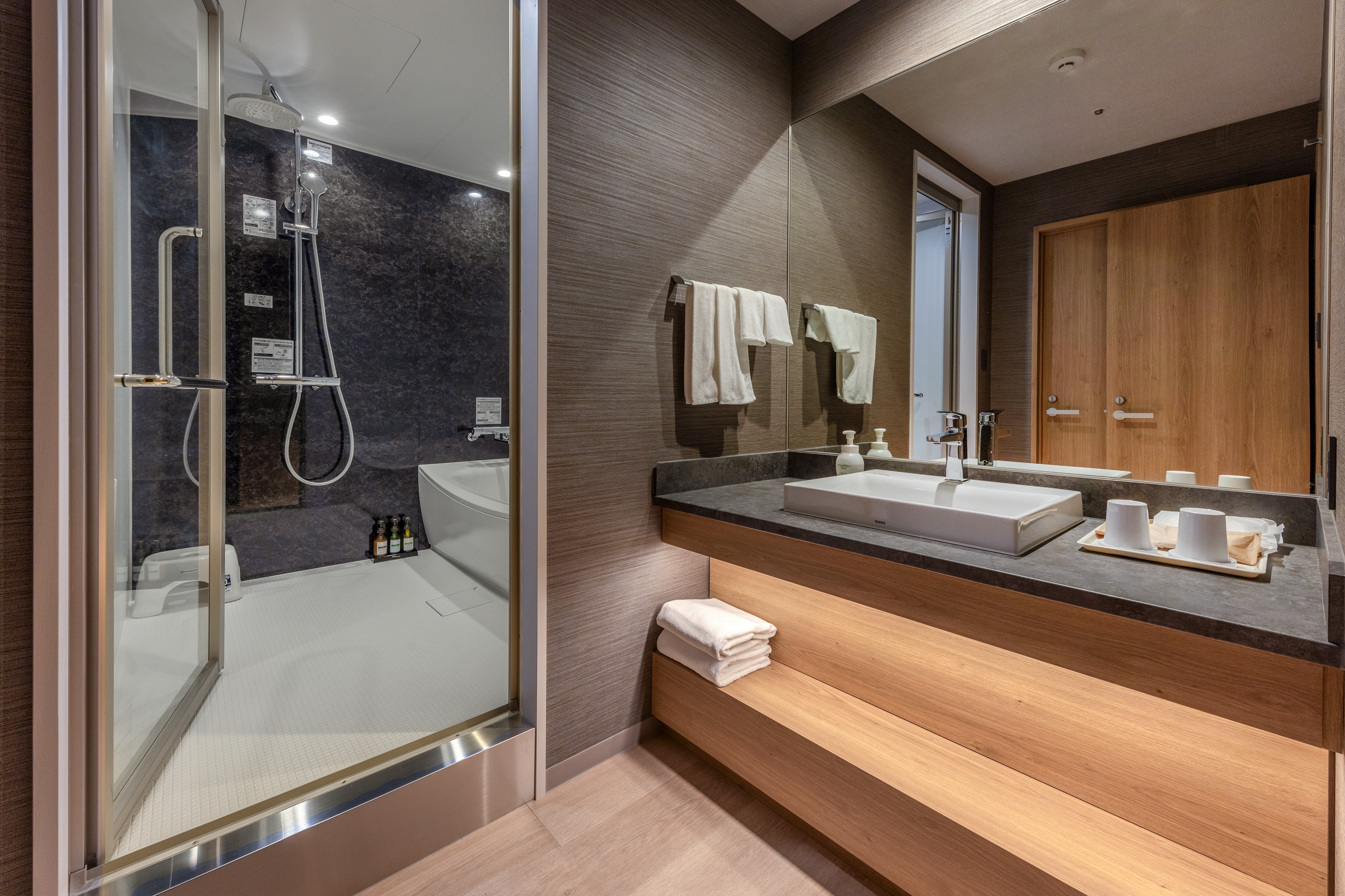 This is an image of the bathroom in the premium twin room.