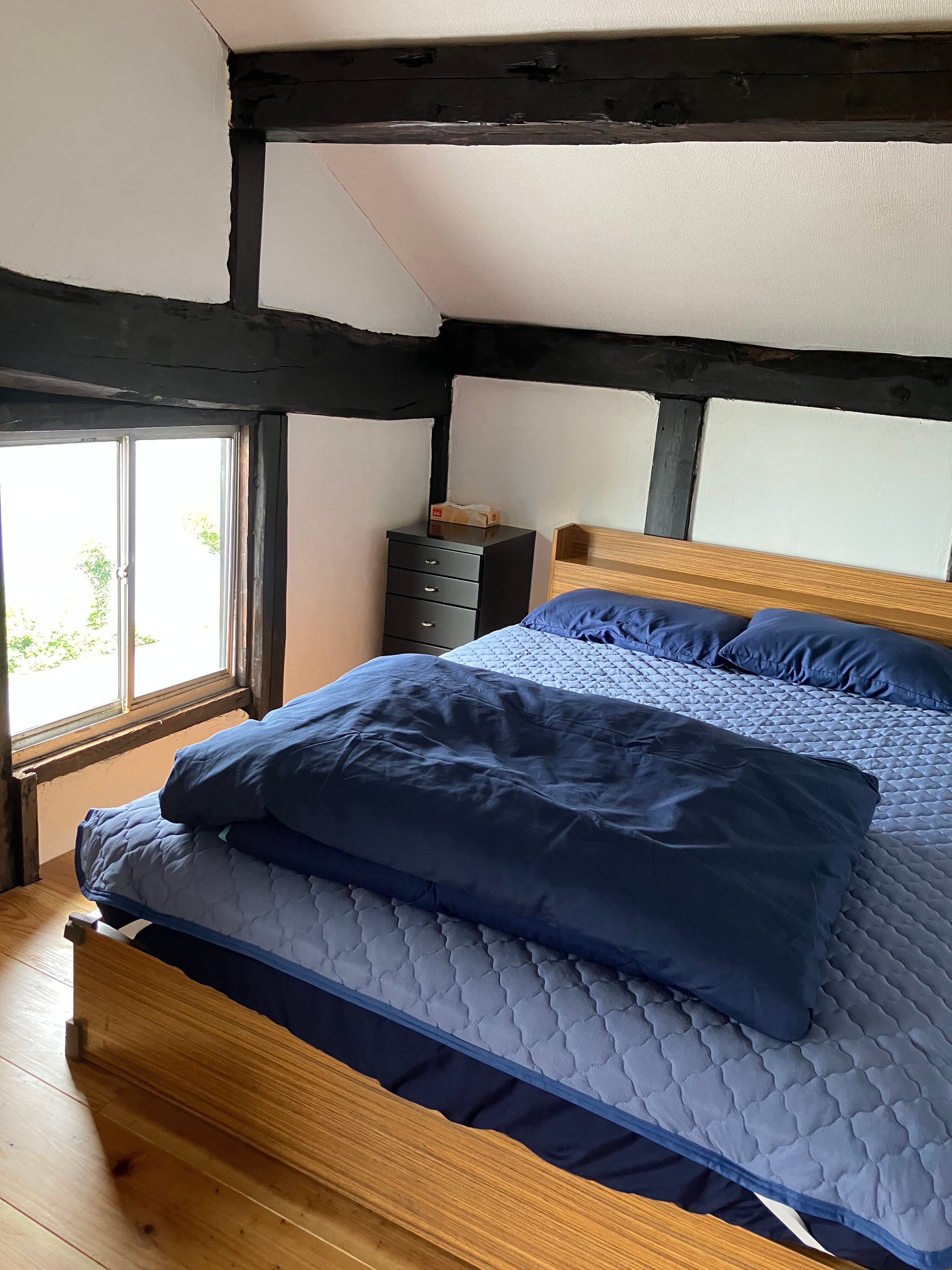 There is one double bed and two tatami mats.