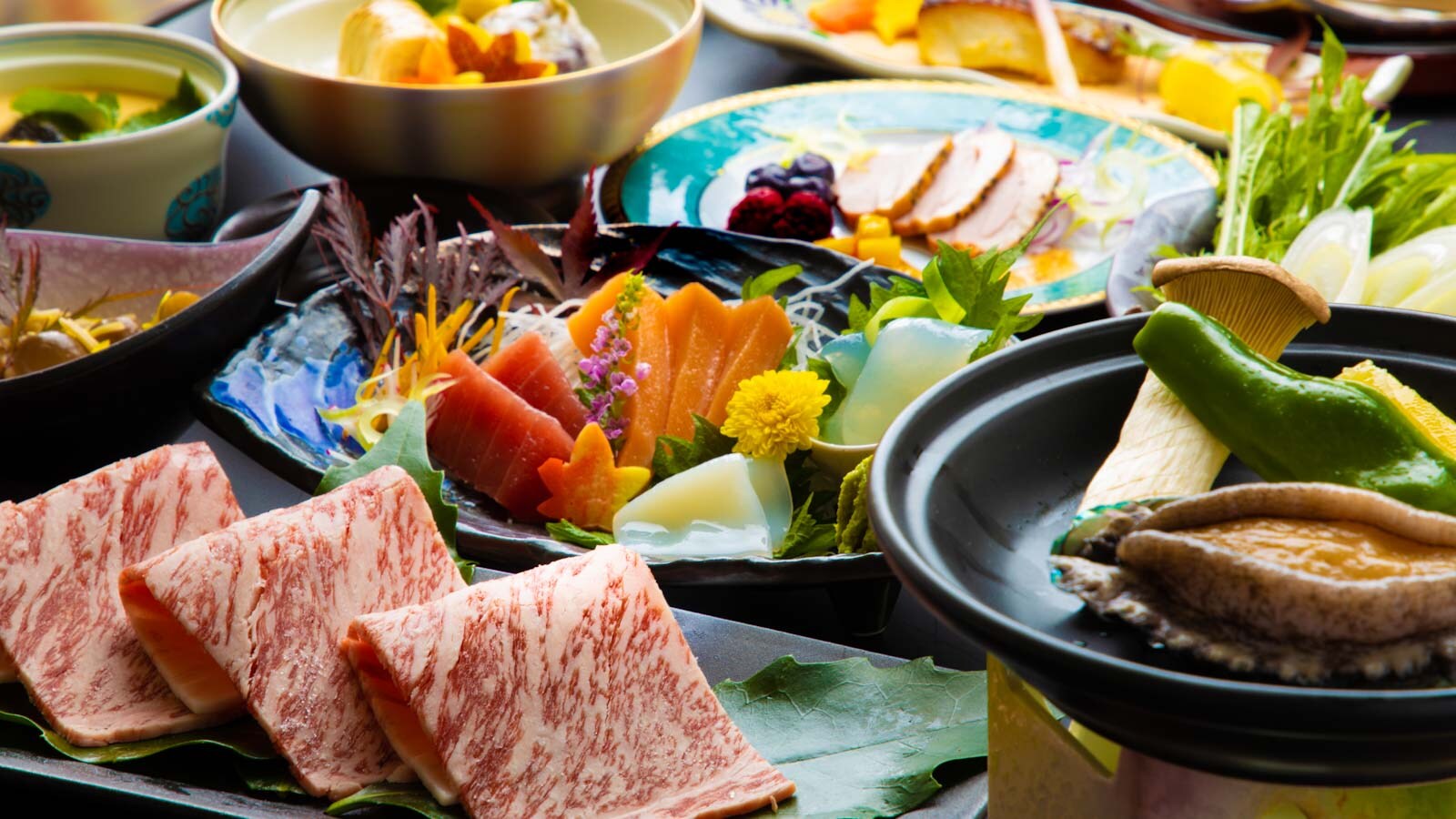 Enjoy the local produce of Joshu with a Kimura Kaiseki dinner featuring Joshu beef and live abalone grilled on a hot plate