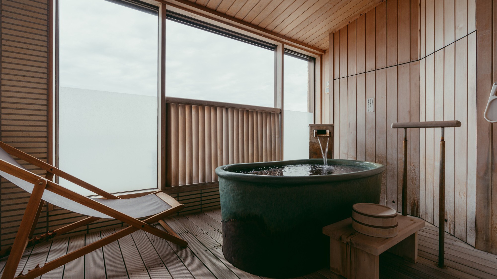 Image of a guest room with an open-air bath