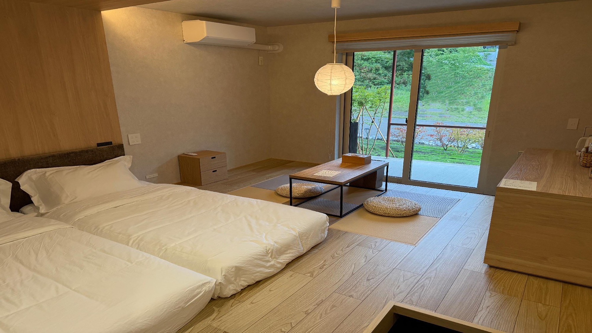 Standard twin room bathed in natural light