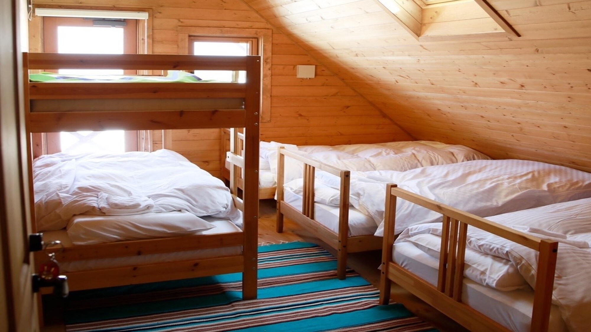 *Example of guest room: 3 single beds, 1 bunk bed (with skylight and terrace)