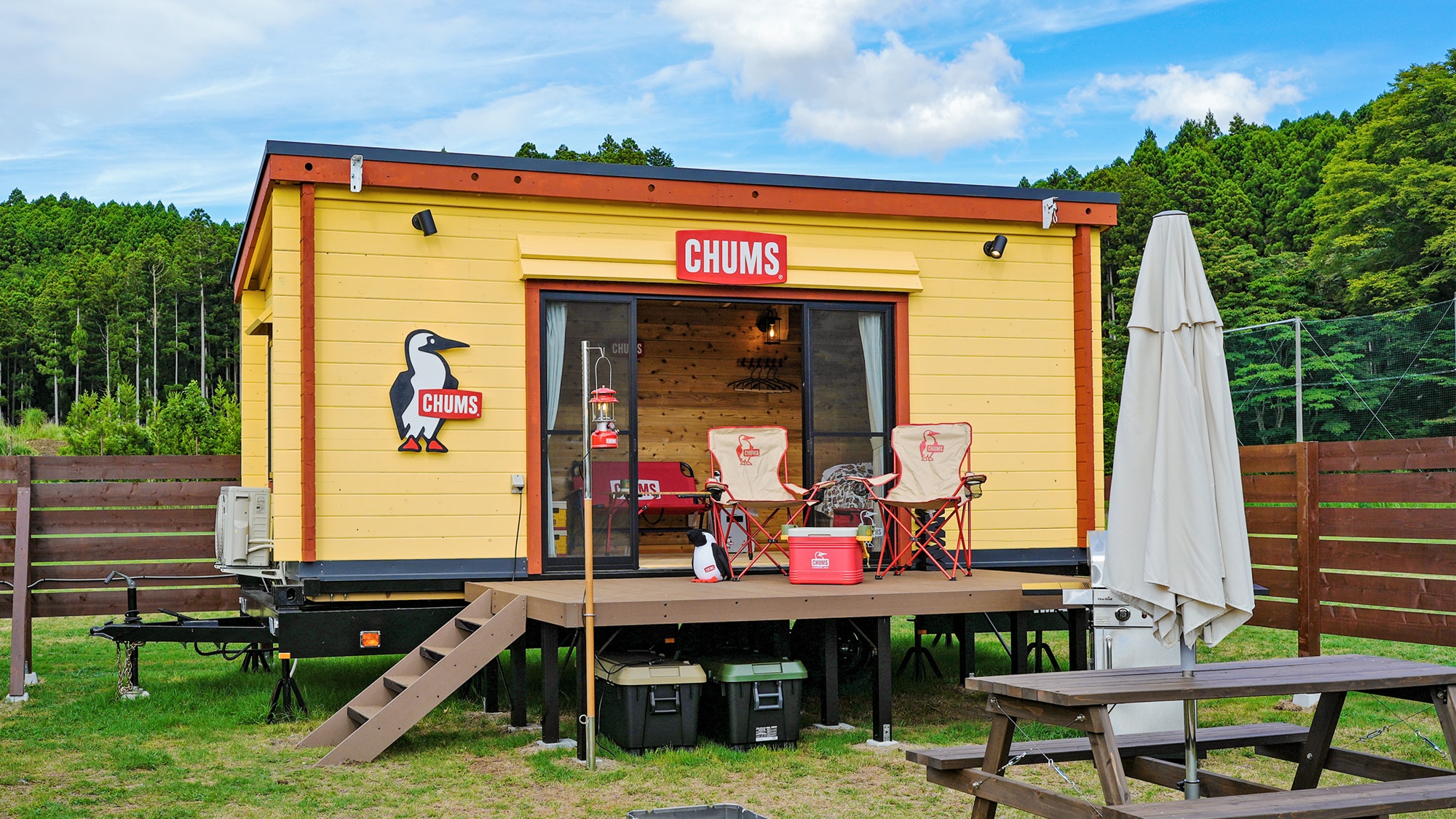 Log trailer house with CHUMS