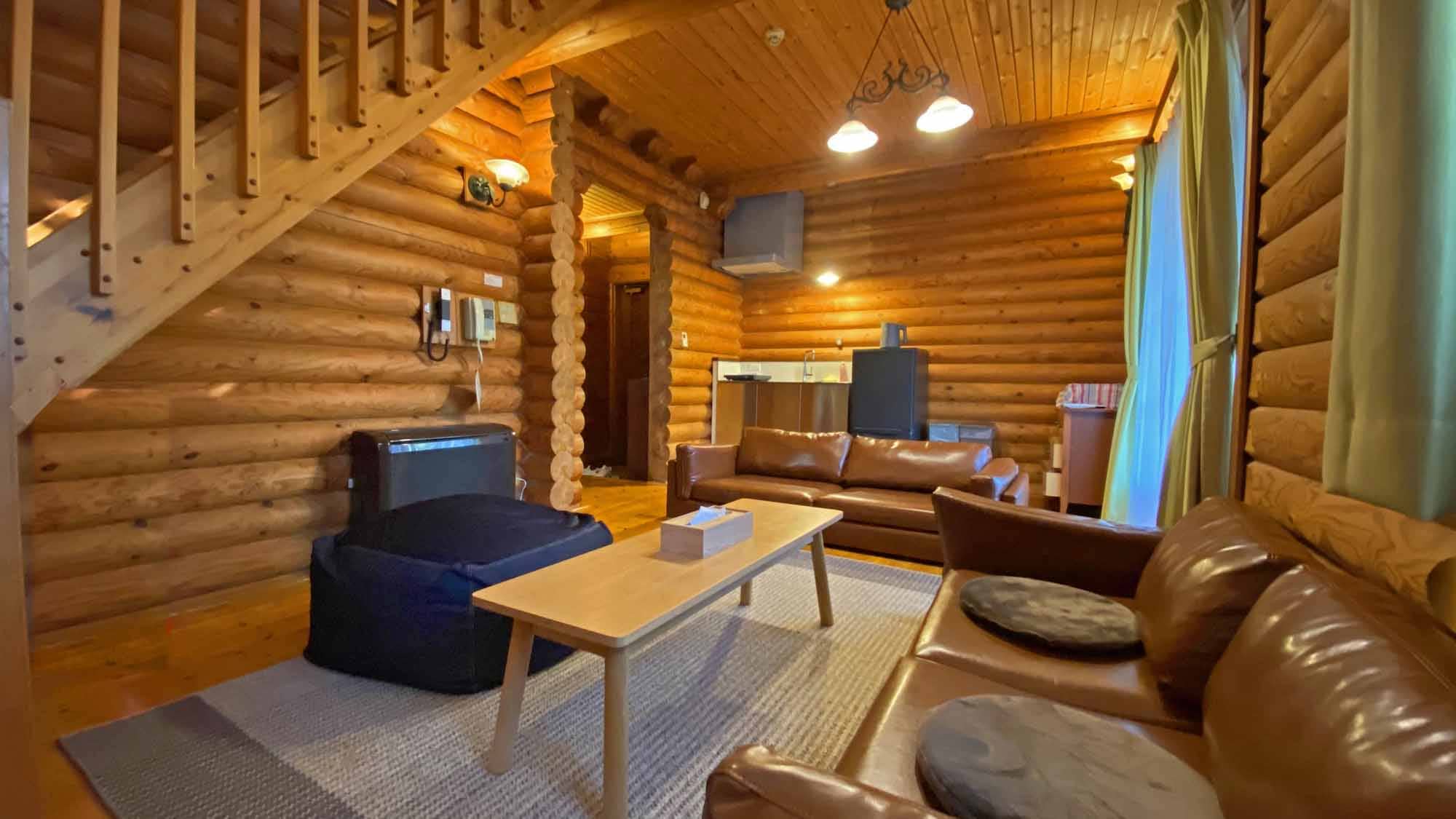 * [Log house Premium Large] The indoor living room is sofa-style and comfortable.