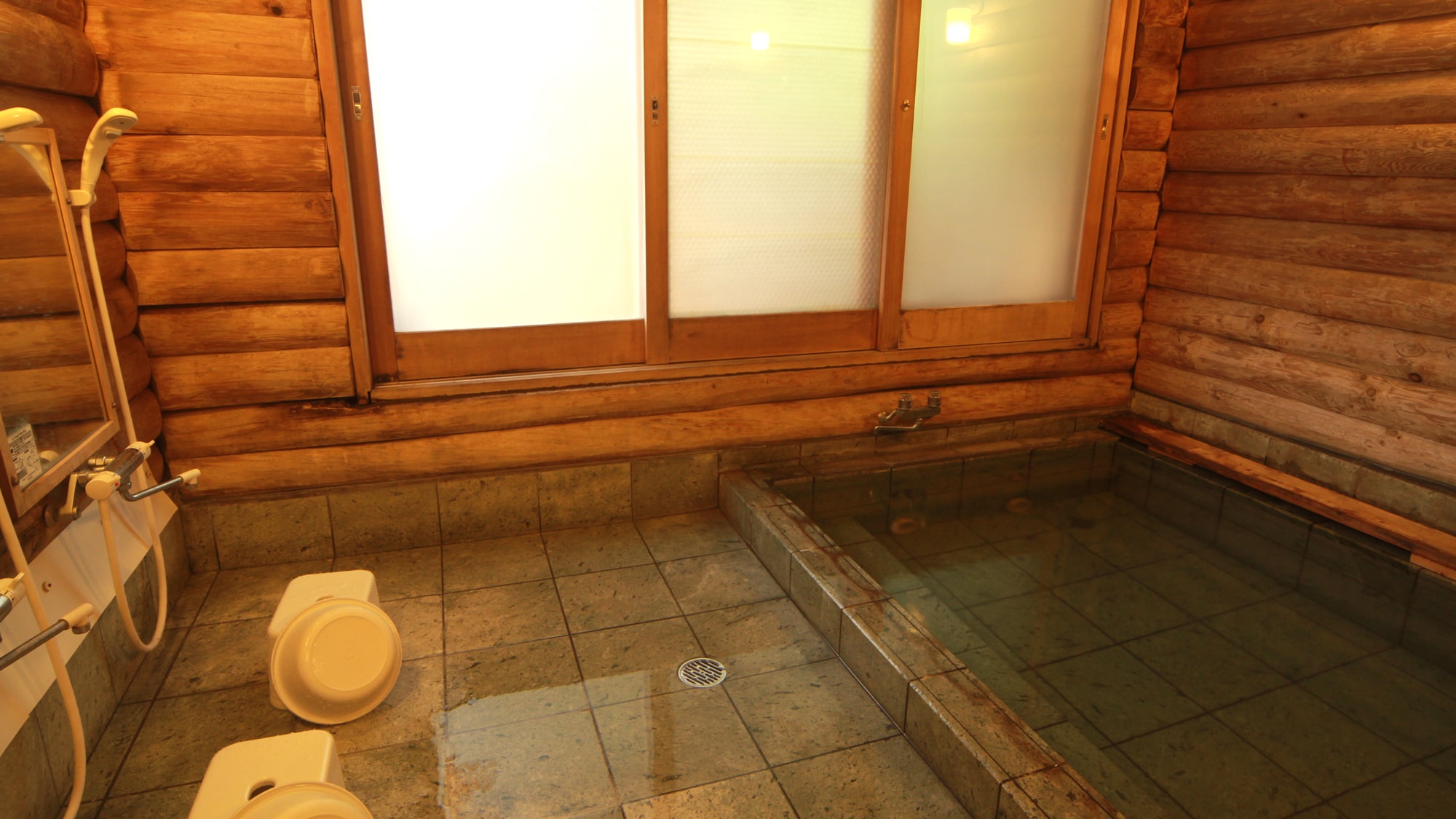 #Private bath_A bath paved with Towada stone, a medicinal stone.