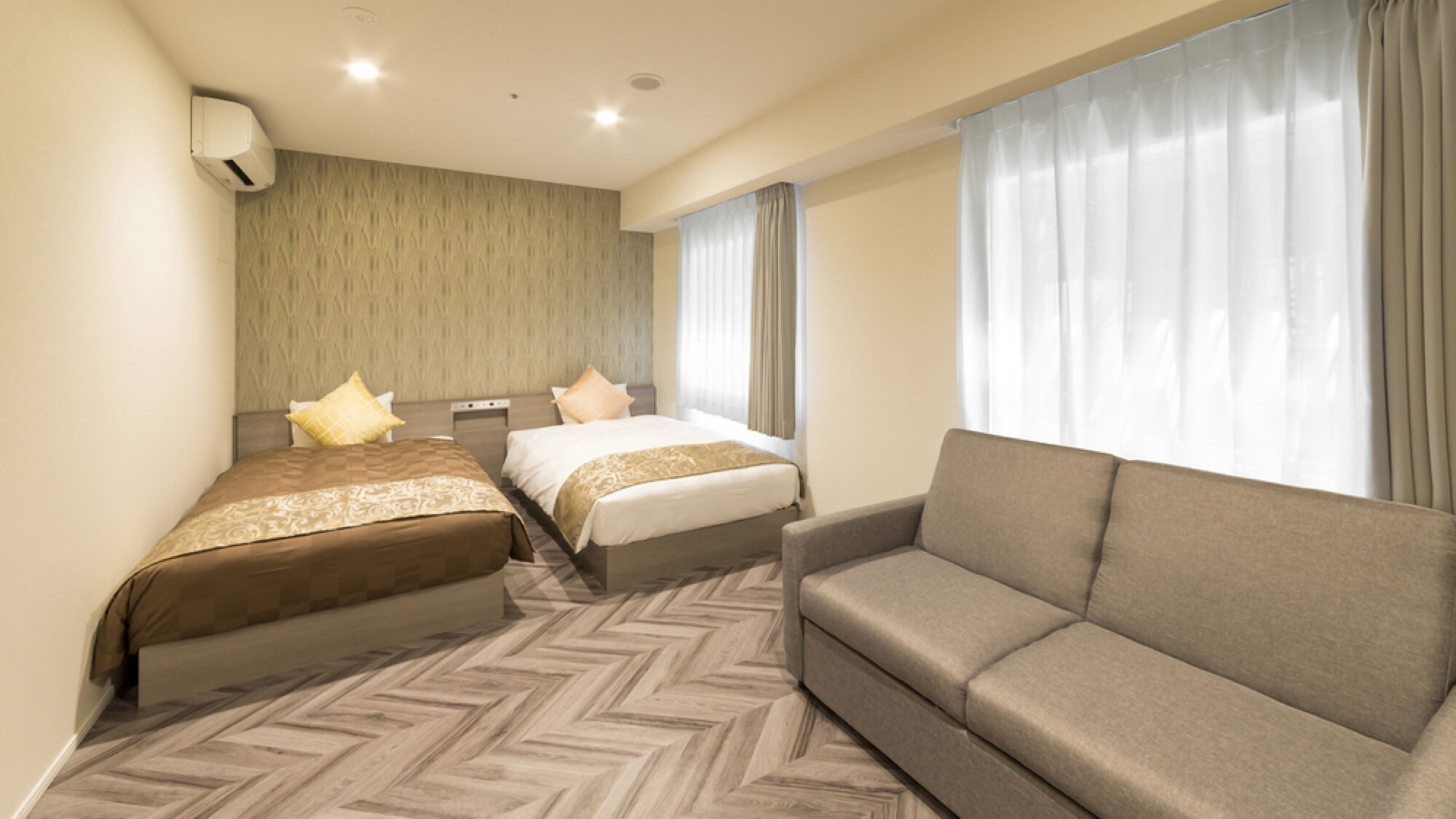 Triple room 28m2/2~3 persons/2 single beds + 1 sofa bed