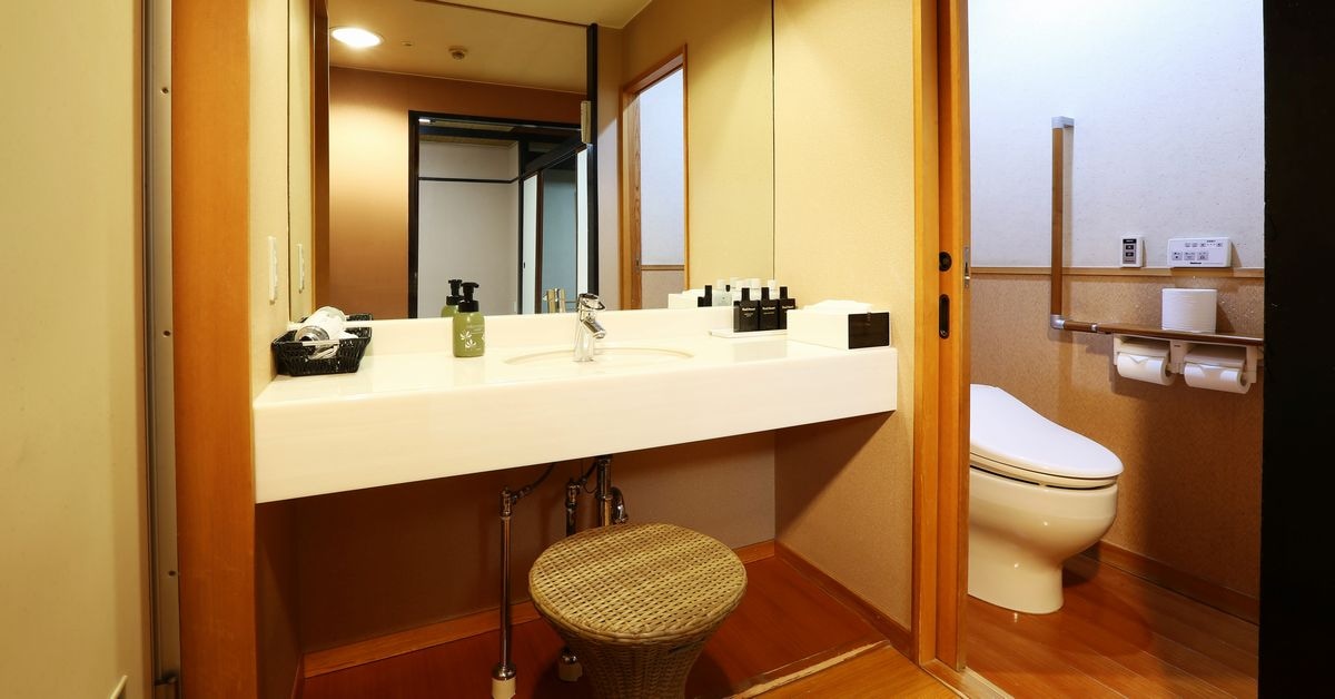[Main guest hall/next room] Powder room and toilet