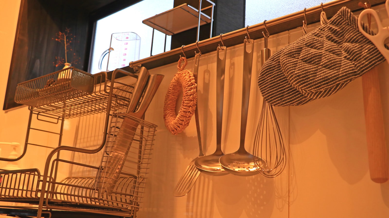 A full range of cooking utensils is provided.