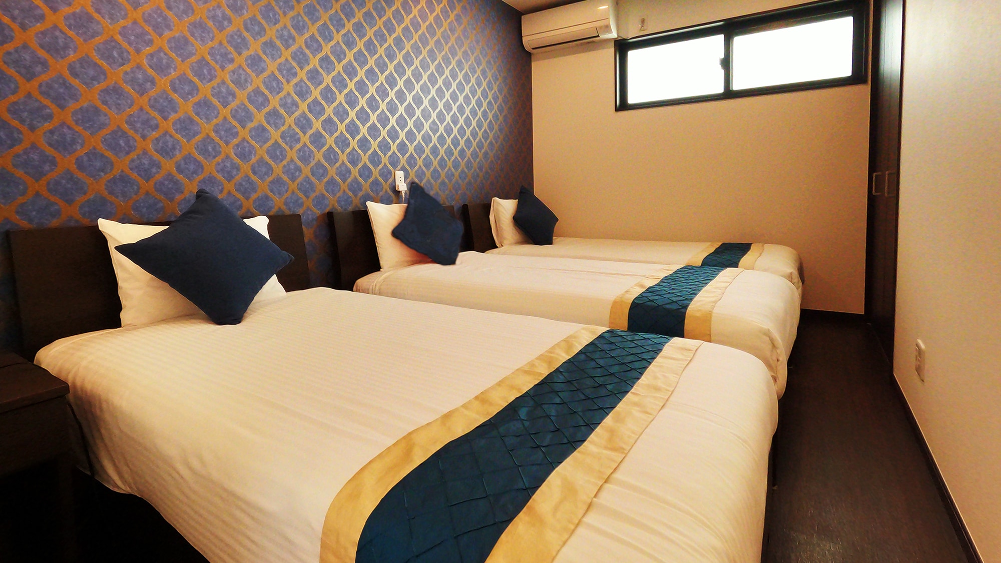 [Executive] The fluffy bed will lull you into a good night's sleep.