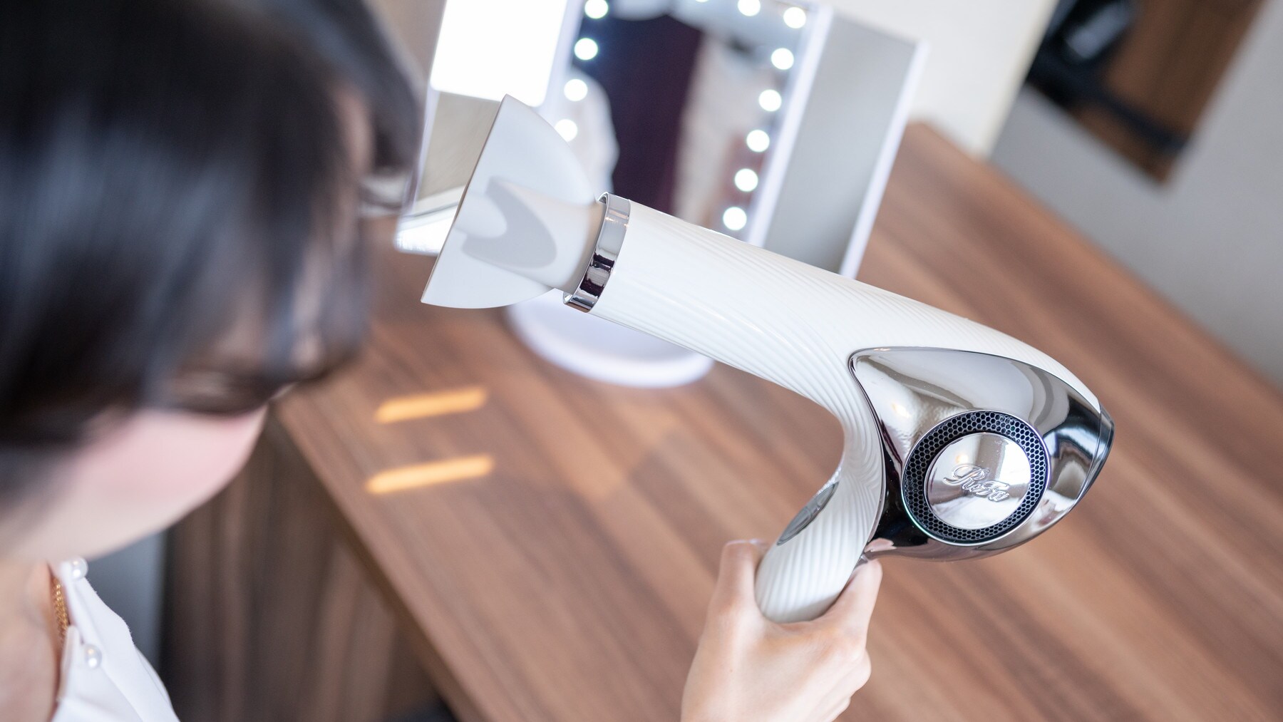 The ReFa Beauty Dryer creates moist and soft rare hair