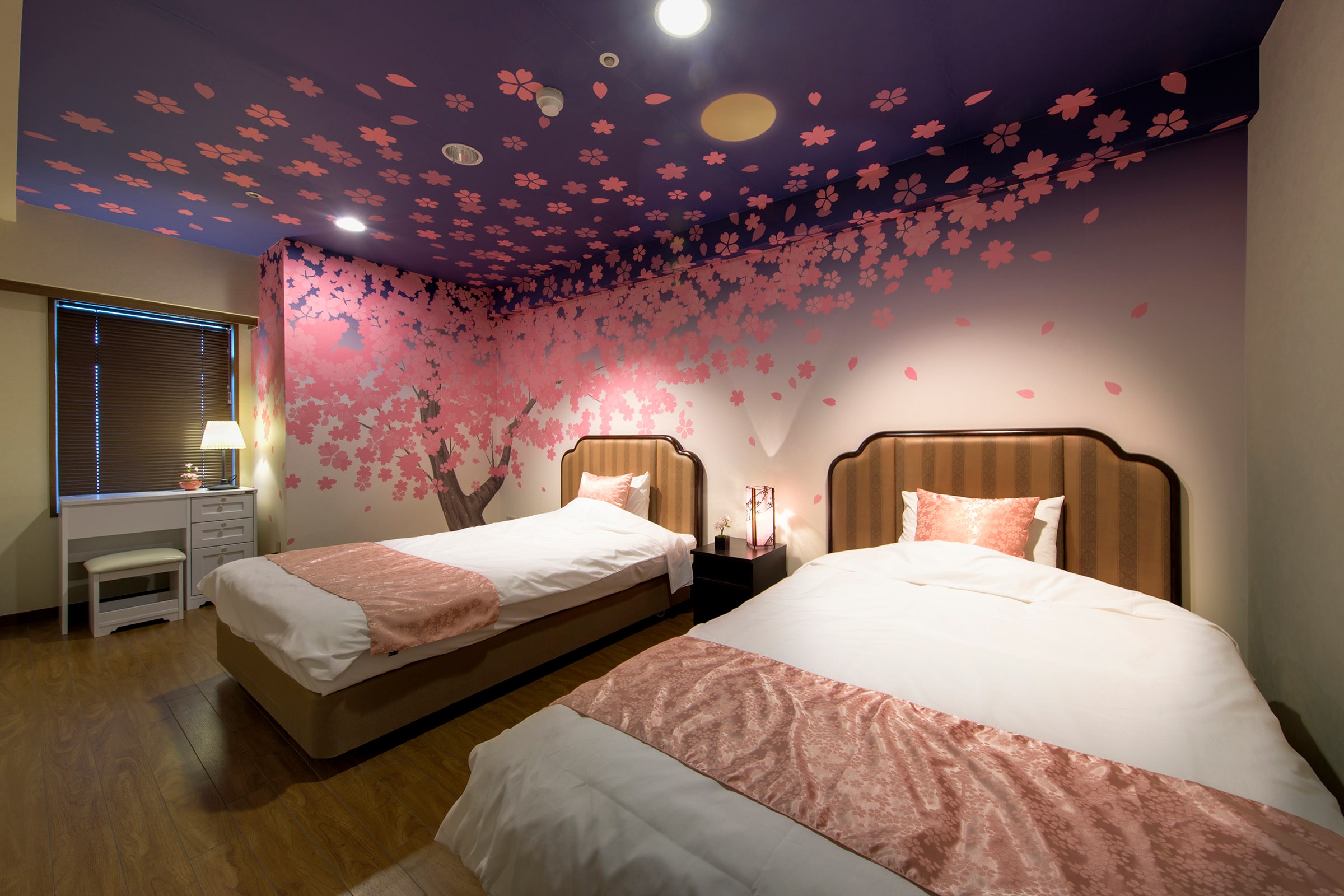 Sakura Room - A bedroom decorated with cherry blossom trees.