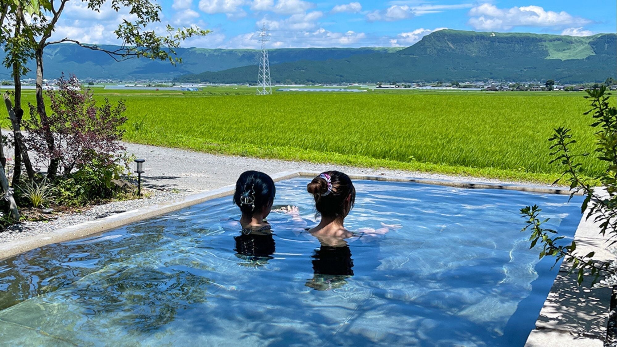 A private pool with free-flowing spring water and a panoramic view of Daikanbo.