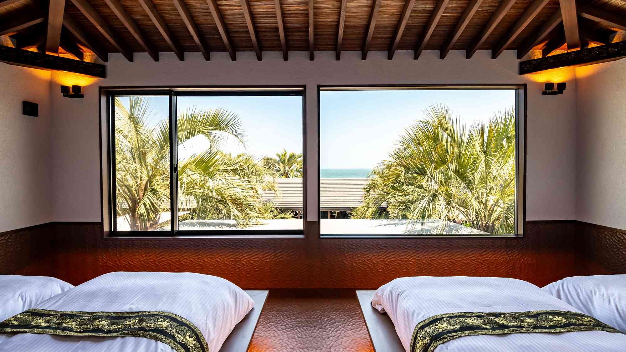 Resort garden and the sea spread out before your eyes