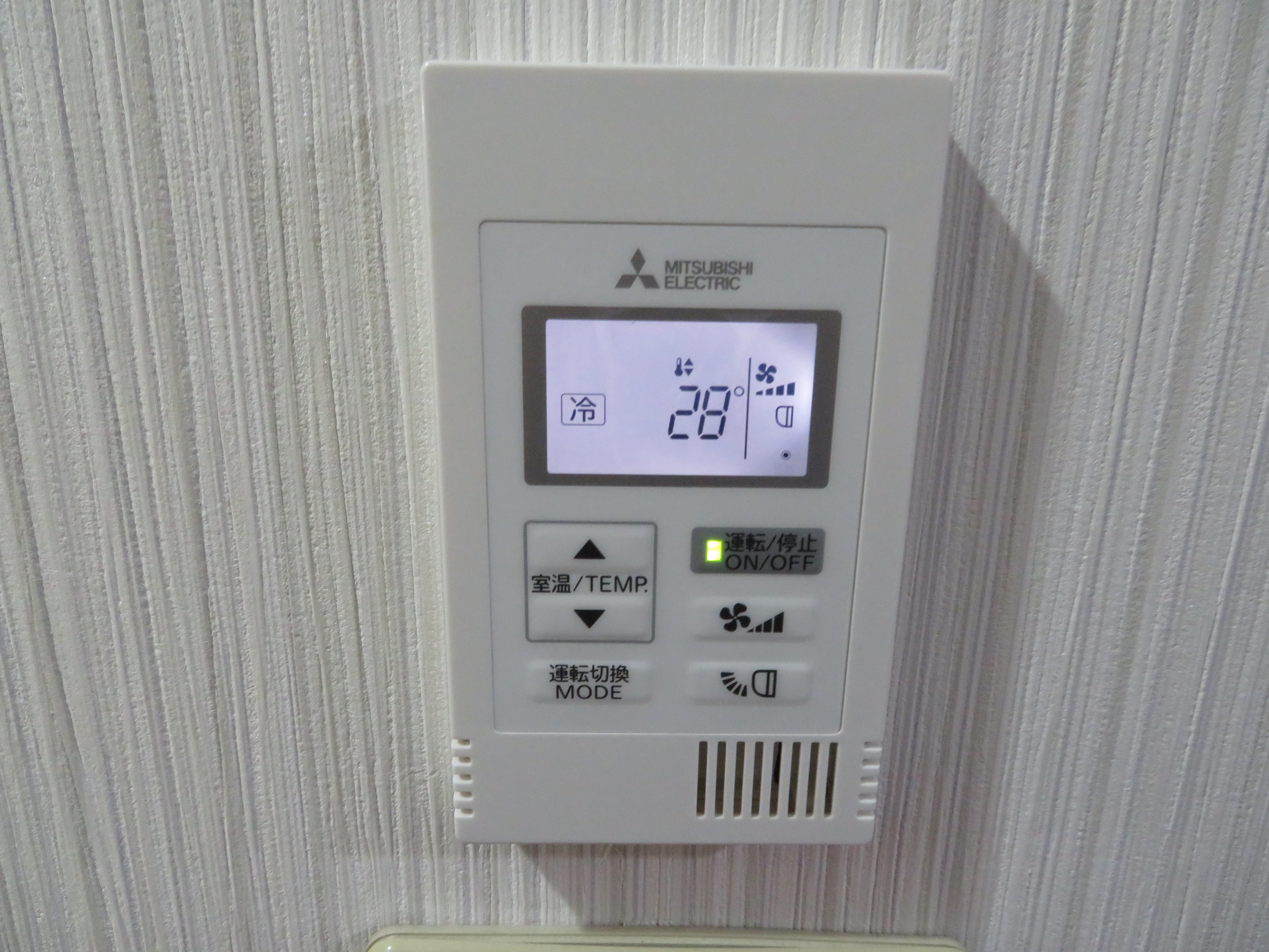 Air conditioner room temperature adjustment panel