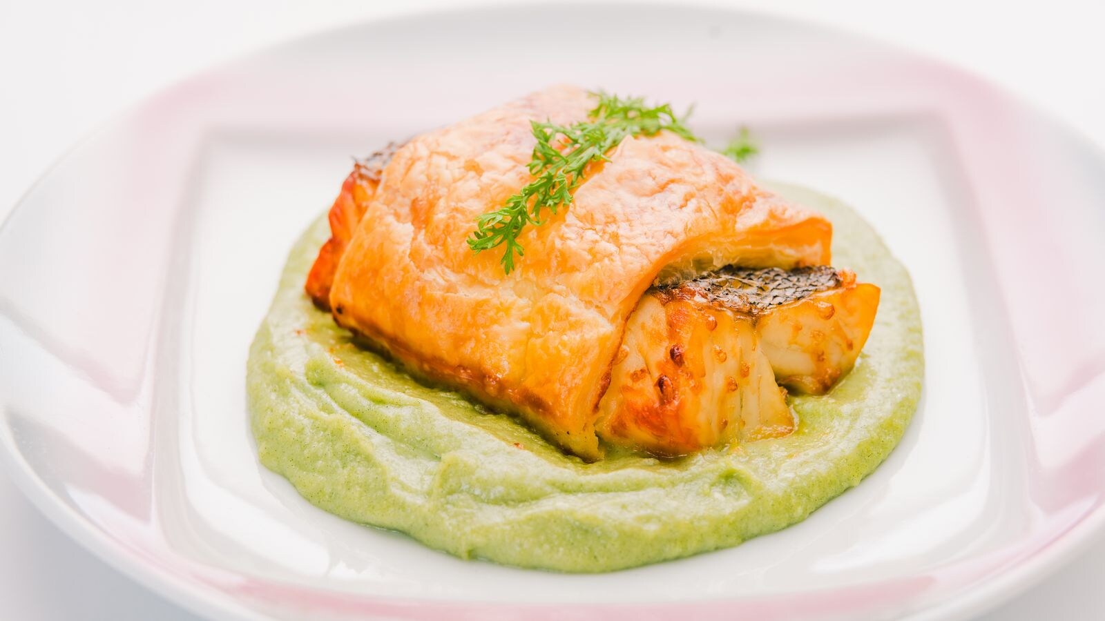 Grilled sea bass wrapped in pastry
