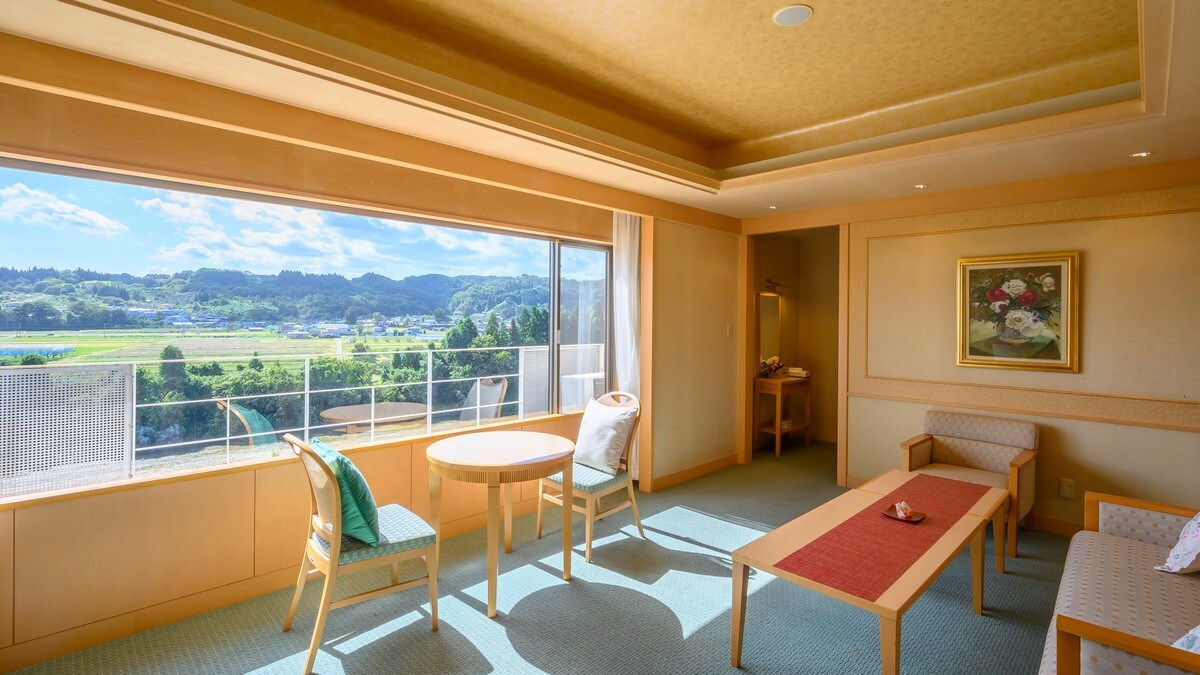 All rooms face the Mogami River (image is deluxe twin)