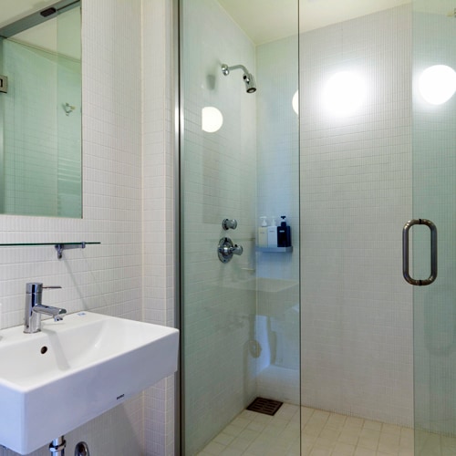 *Example of a 2-bedroom deluxe or premium room/Refresh yourself after a long day in the shower booth!