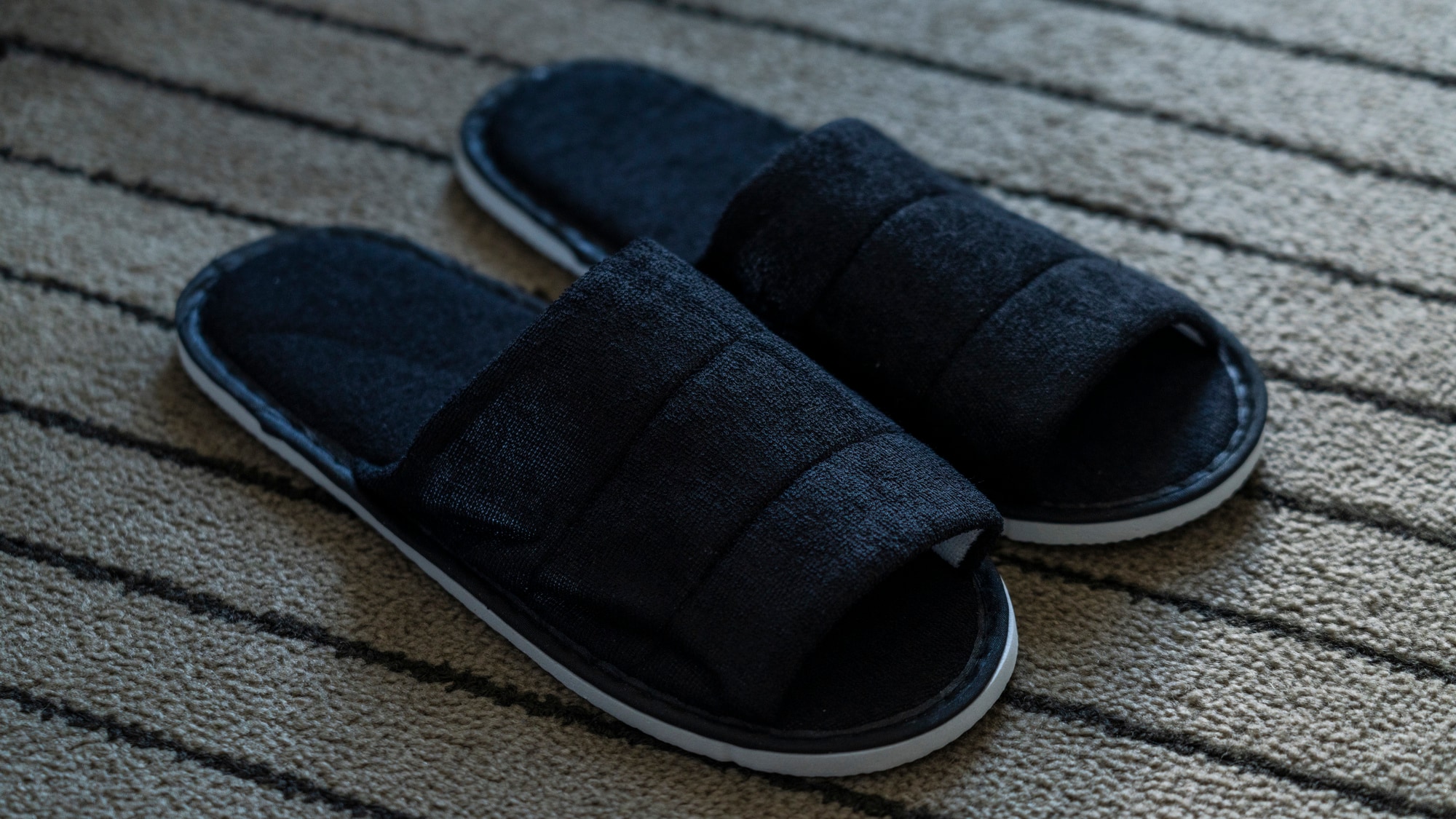 Comfortable single-use slippers are available in all rooms.